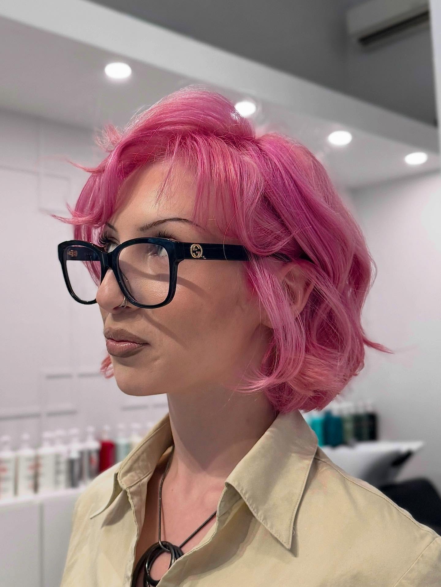 Playful Pink Layered Chin-Length Bob with Lifted Mini Curtain Fringe