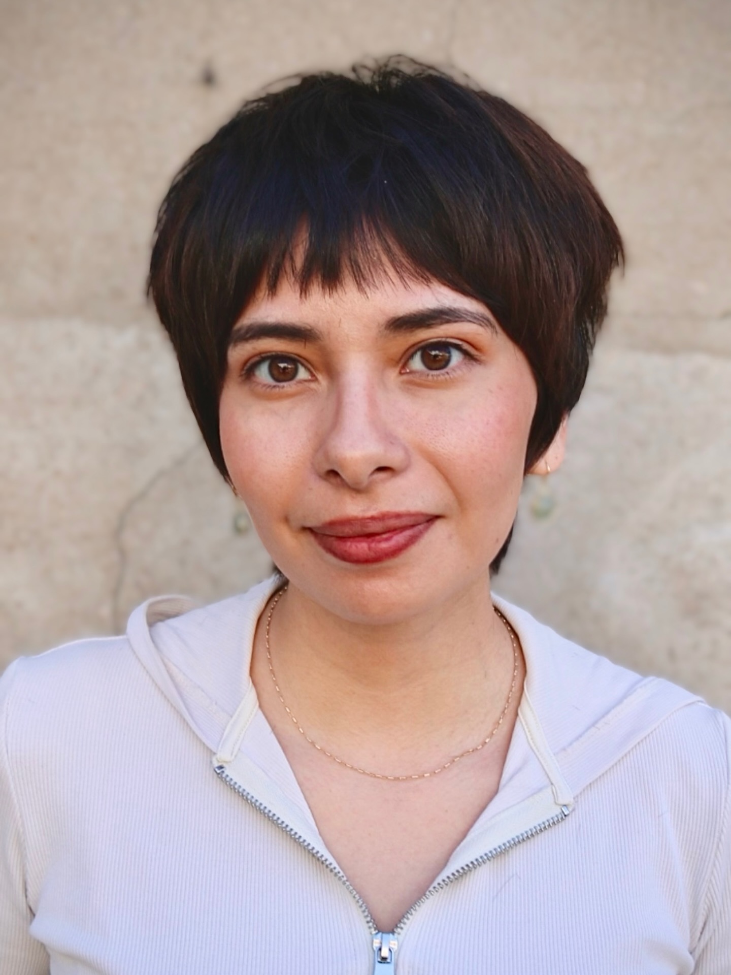 Short Soft Layered Pixie with Baby Fringe and Rounded Crown