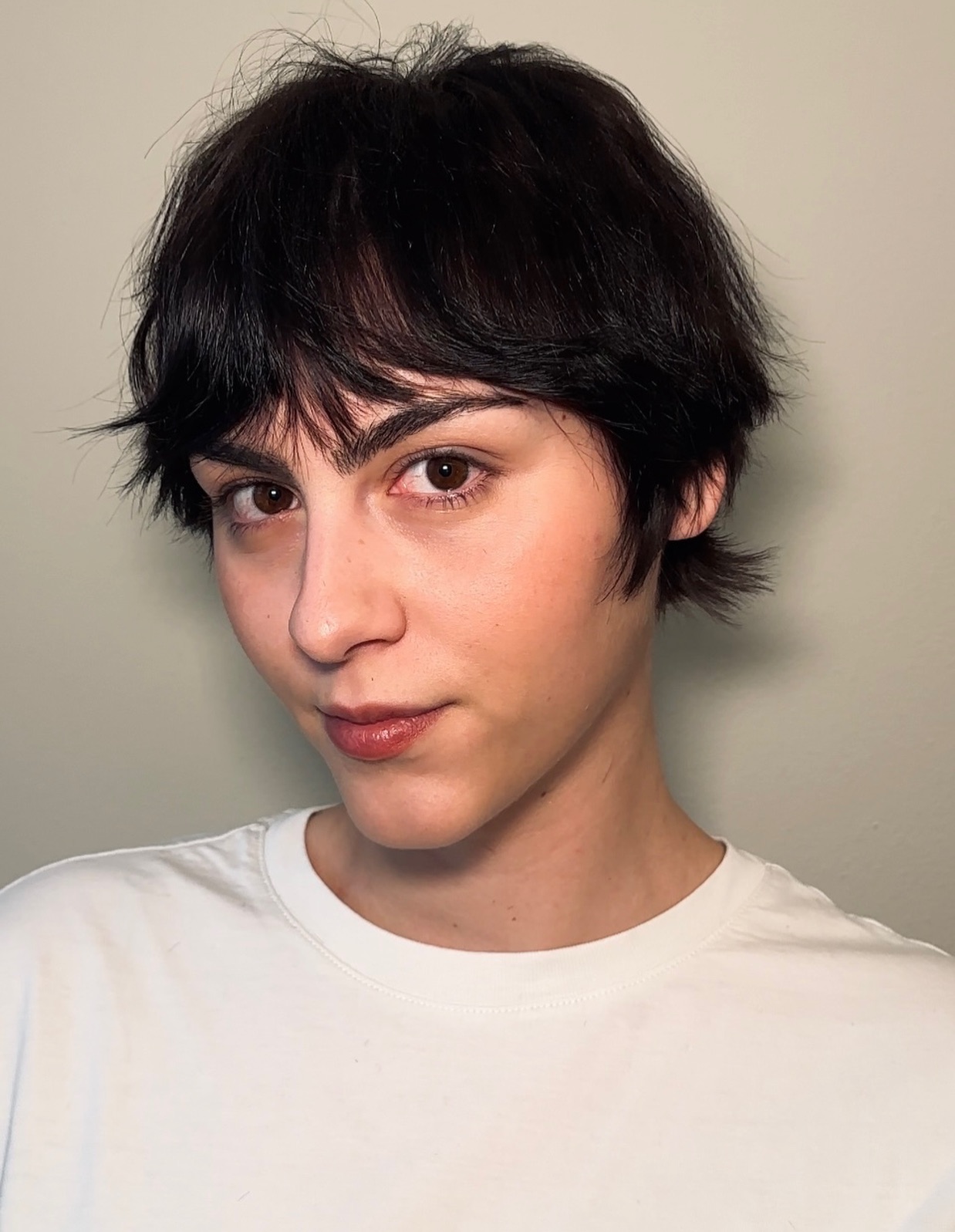 Textured Dark Pixie with Feathered Perimeter and Notched Micro-Bangs