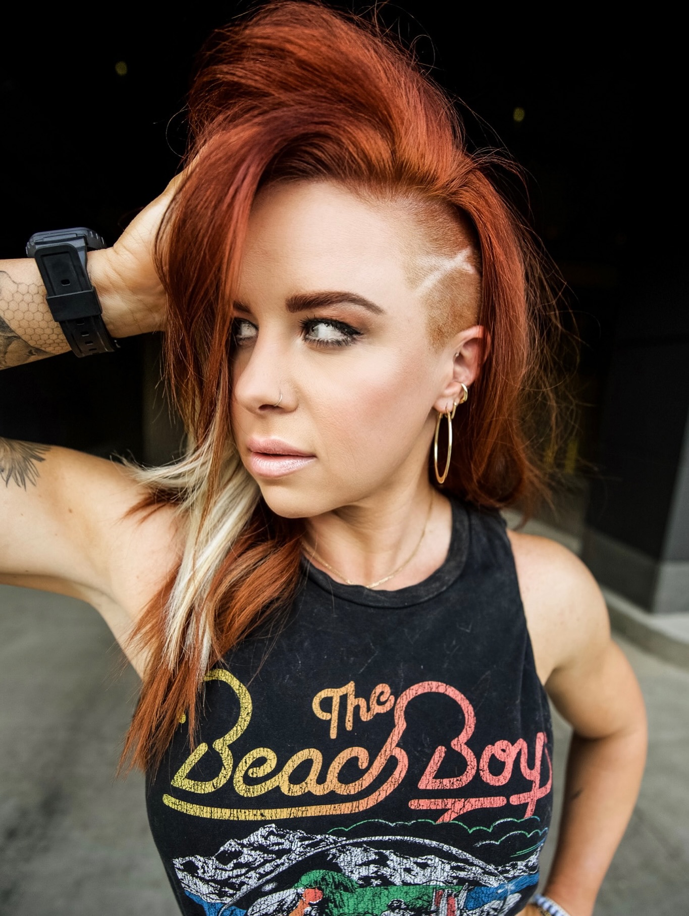 Voluminous Copper Pompadour with Razored Undercut and Platinum Peekaboo