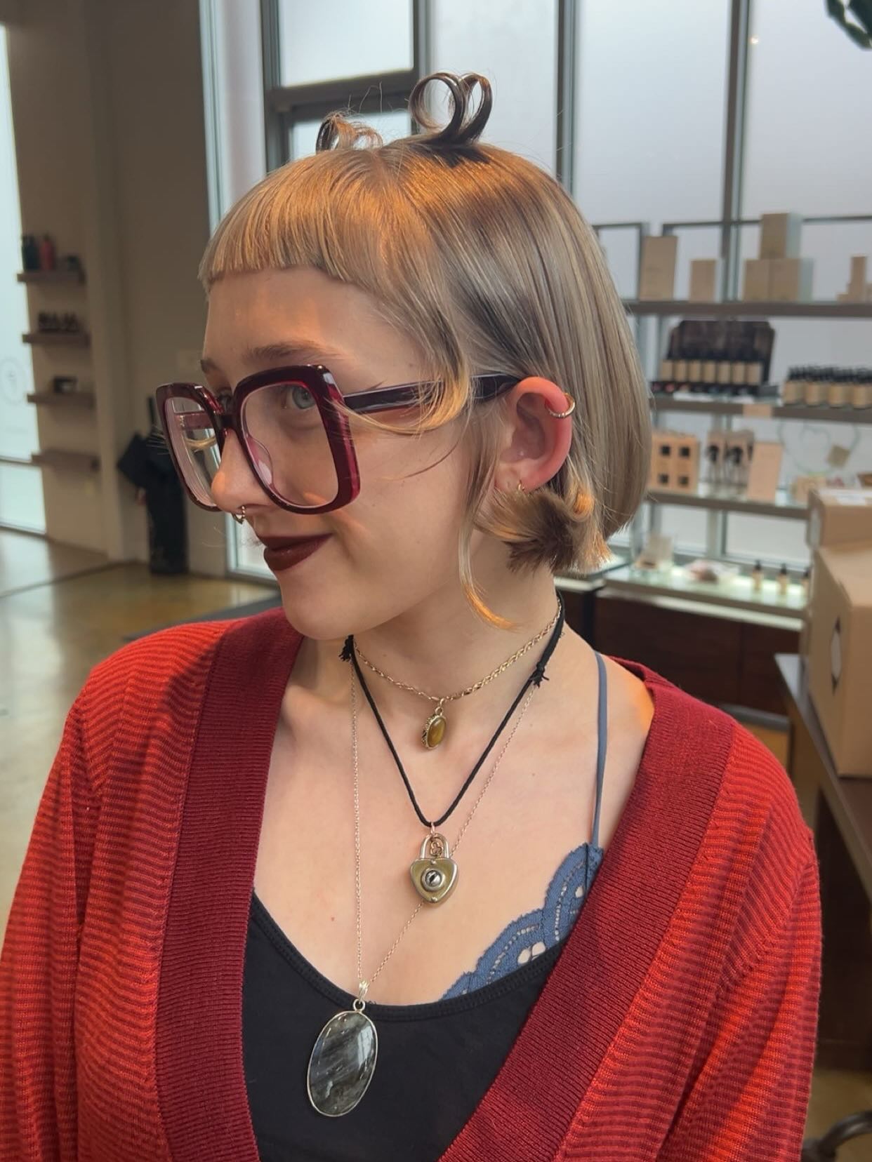 Cropped Ash-Blonde Micro Bob with Pin-Loop Detail