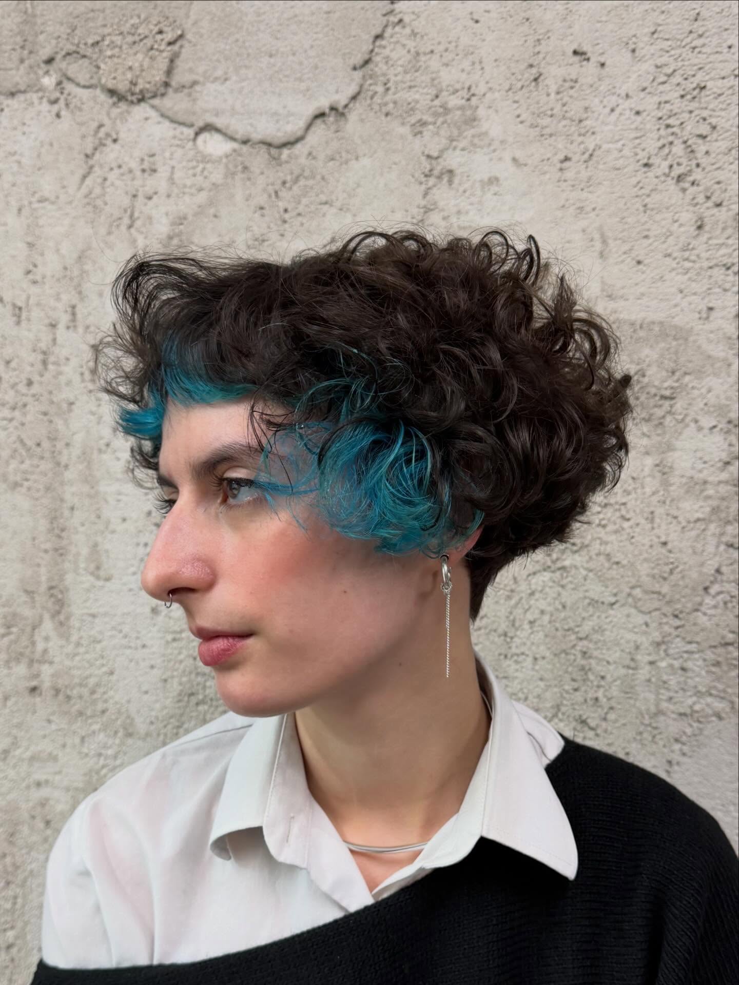 Curly Ear-Length Micro Bob with Teal Face-Framing Panels