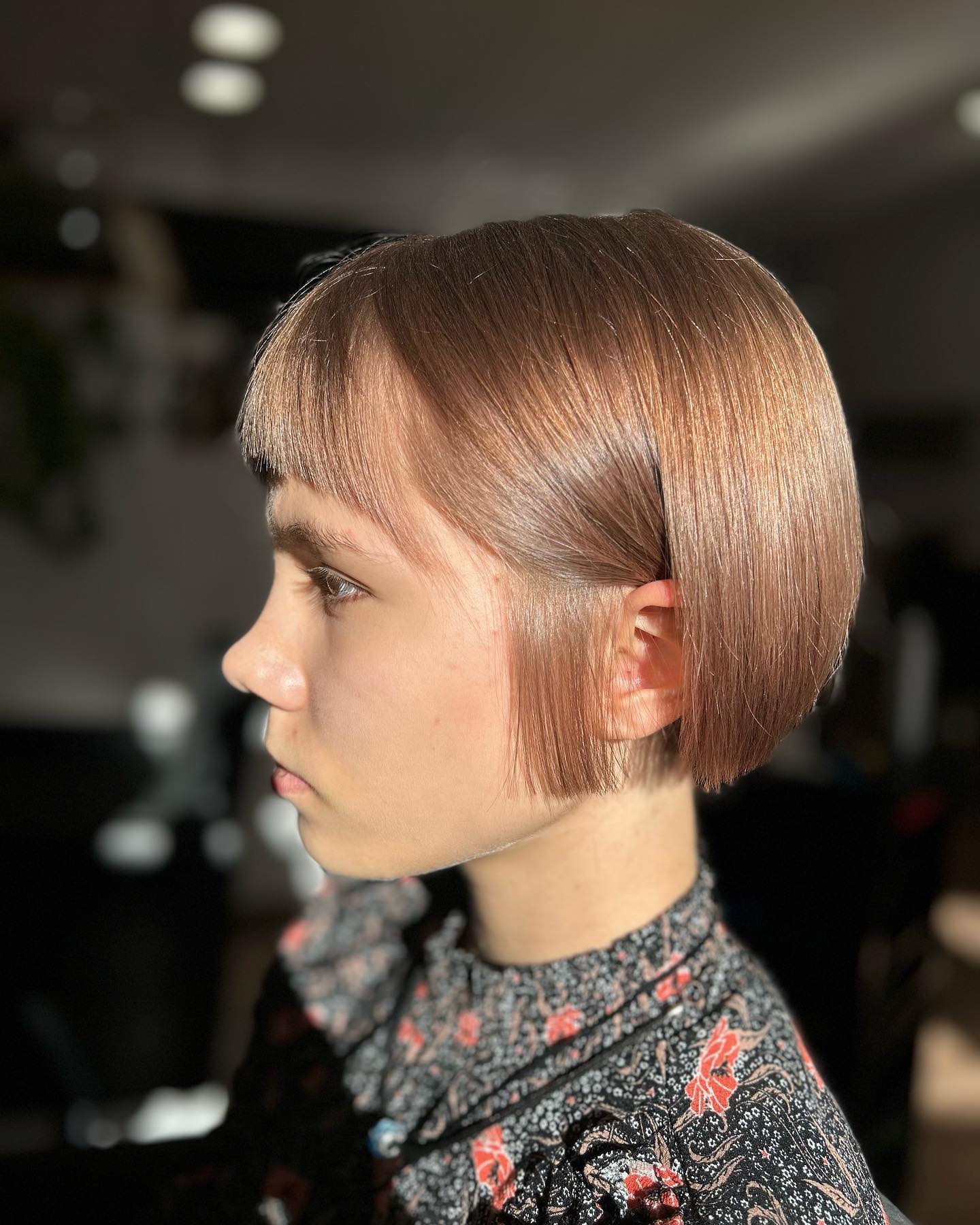 Sleek Ear-Grazing Blunt Micro Bob with Short Micro Fringe