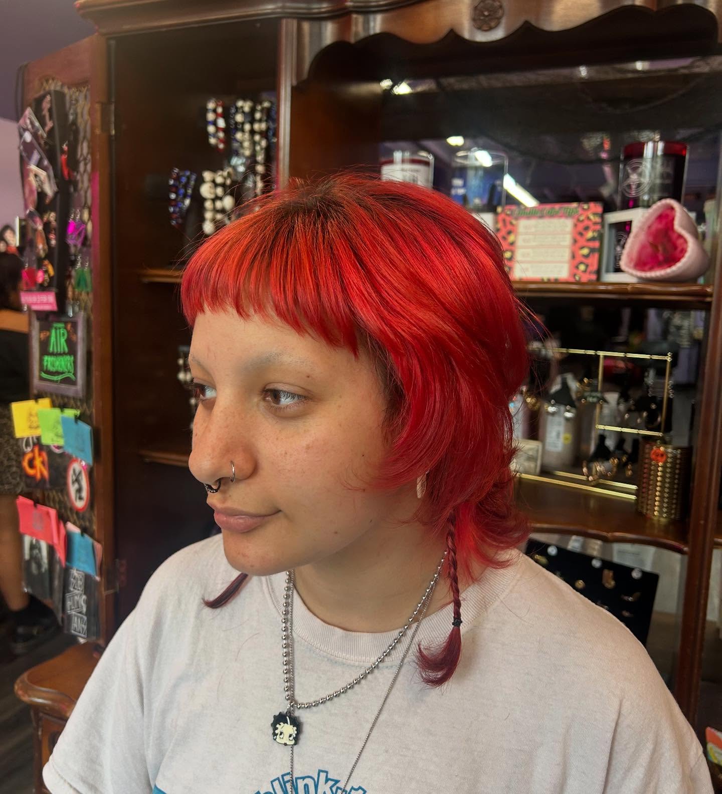 Edgy Layered Mullet with Cropped Micro Bangs and Braided Face-Strands