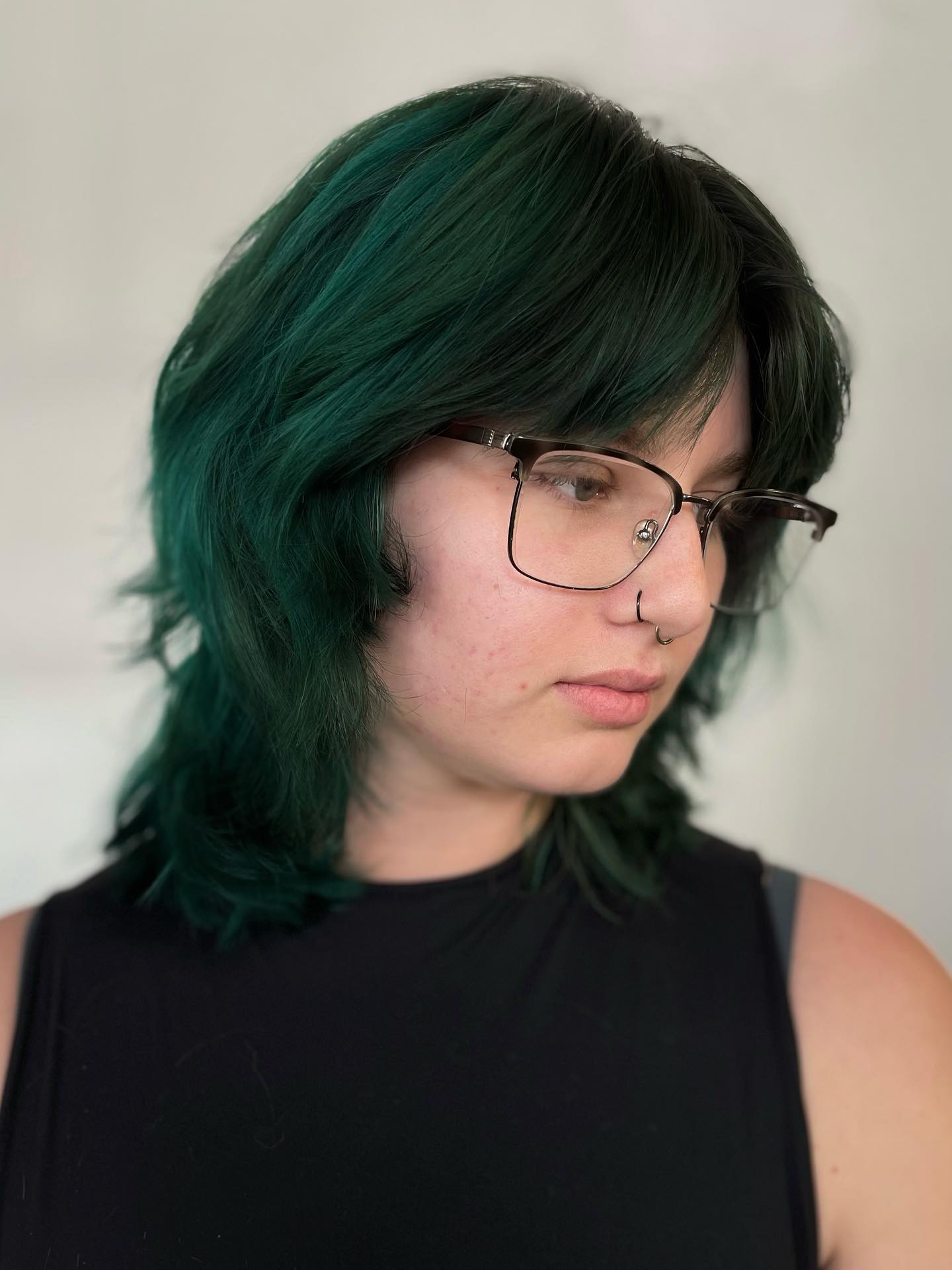 Emerald Layered Short Wolf Cut with Glasses-Friendly Fringe