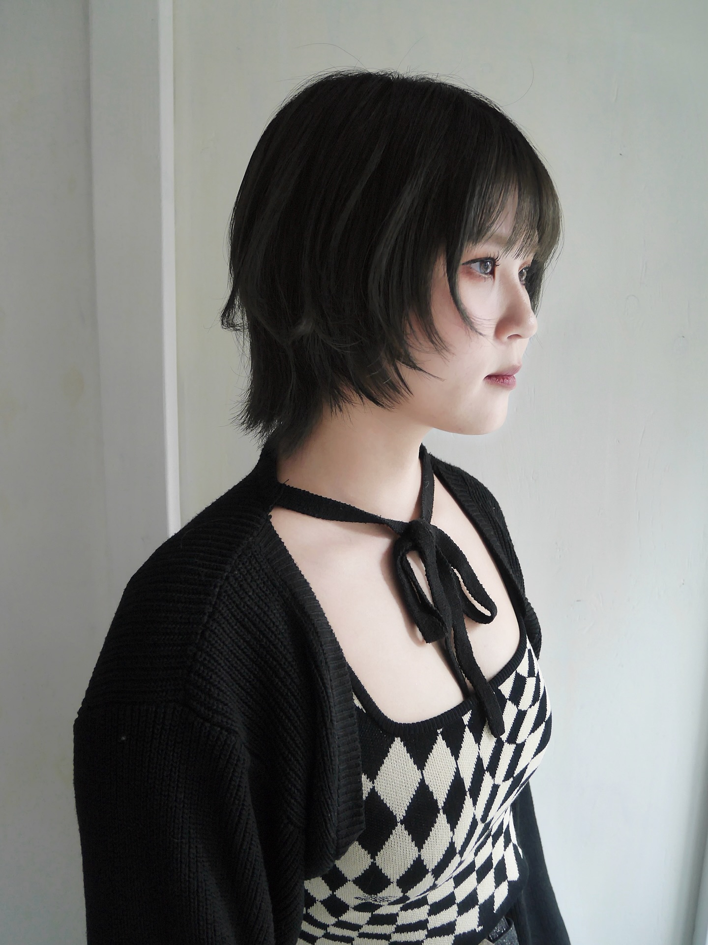 Textured Short Wolf Cut with Wispy Bangs