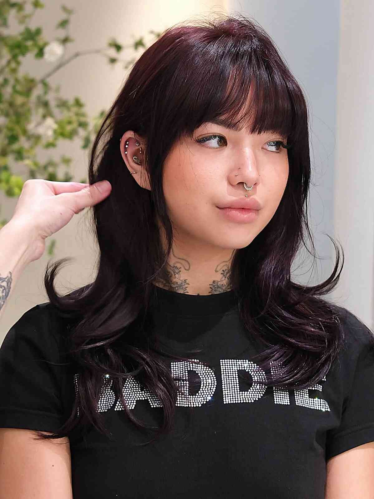 Stylish Hush Cut with Soft Layers and Bangs