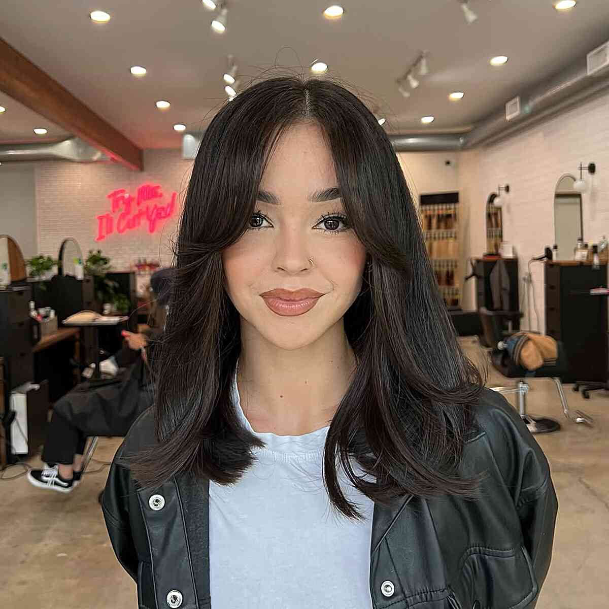 Modern Layered Cut with Soft Face-Framing Bangs