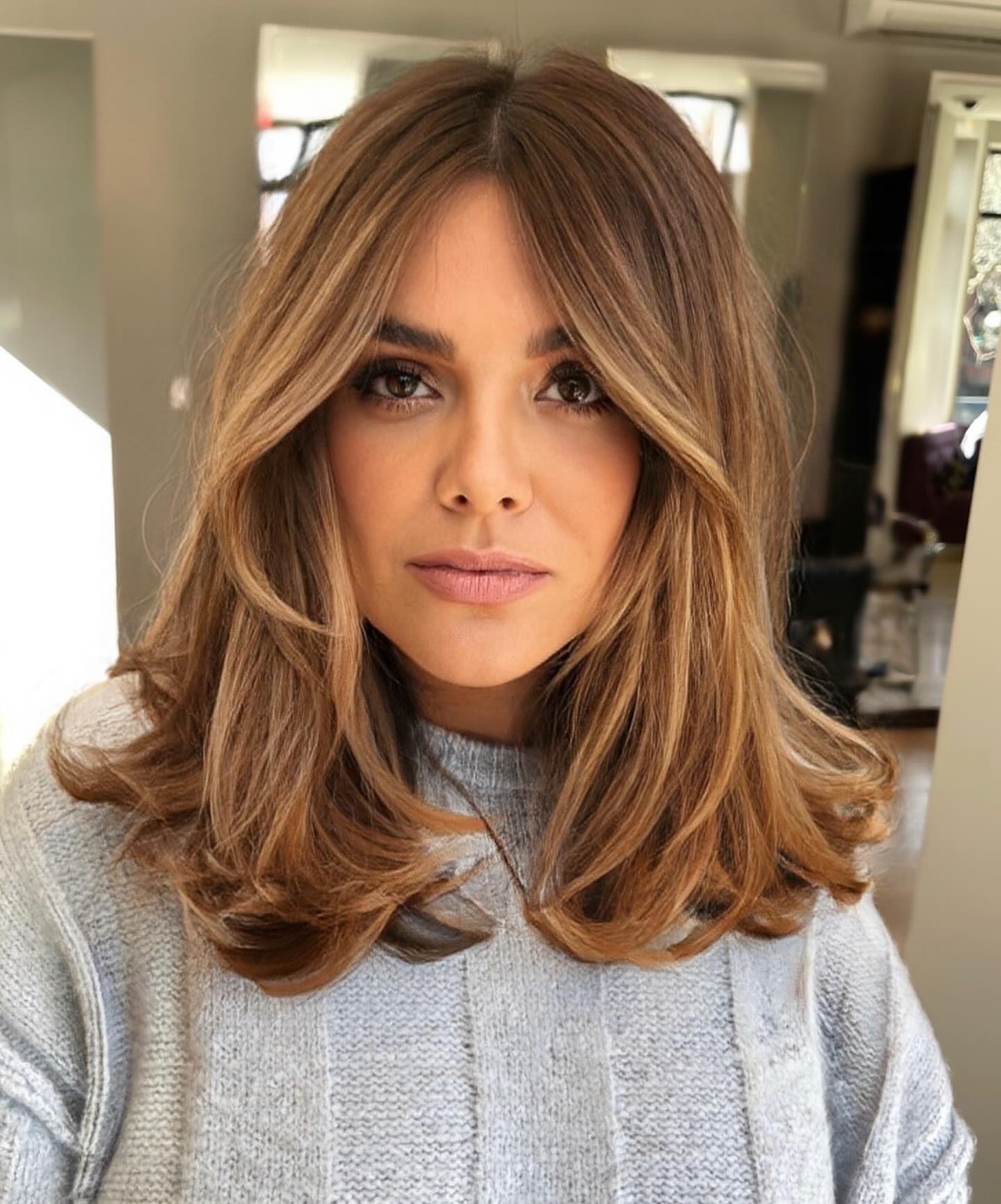 Caramel Layered Lob with Face-Framing Curtain Parting