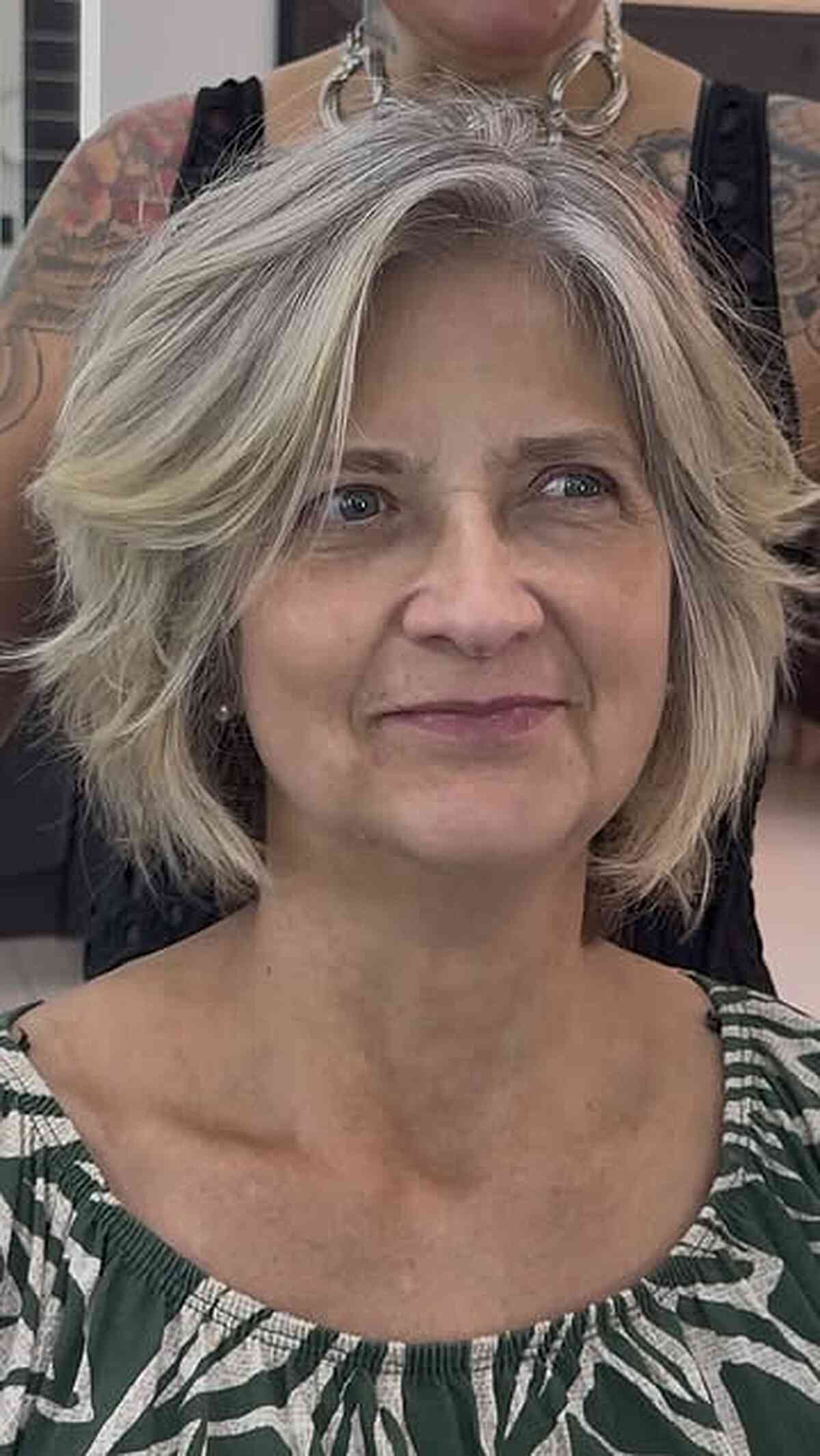 Chic Feathered Silver Blonde Layered Bob