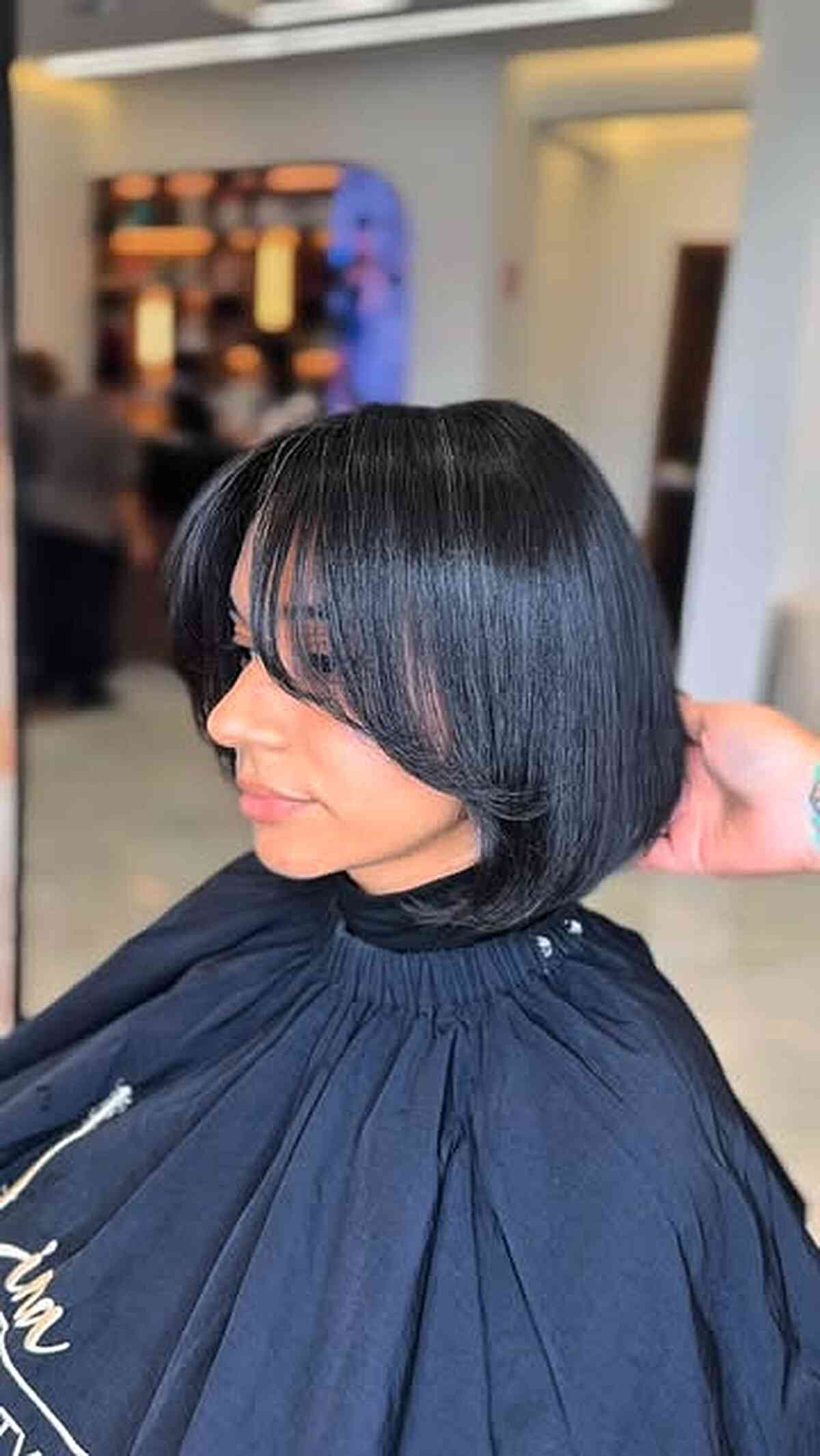 Sleek Chin-Length Bob with Curtain Fringe