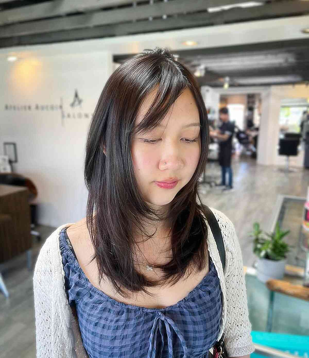 Soft Layered Brunette Cut with Subtle Bangs