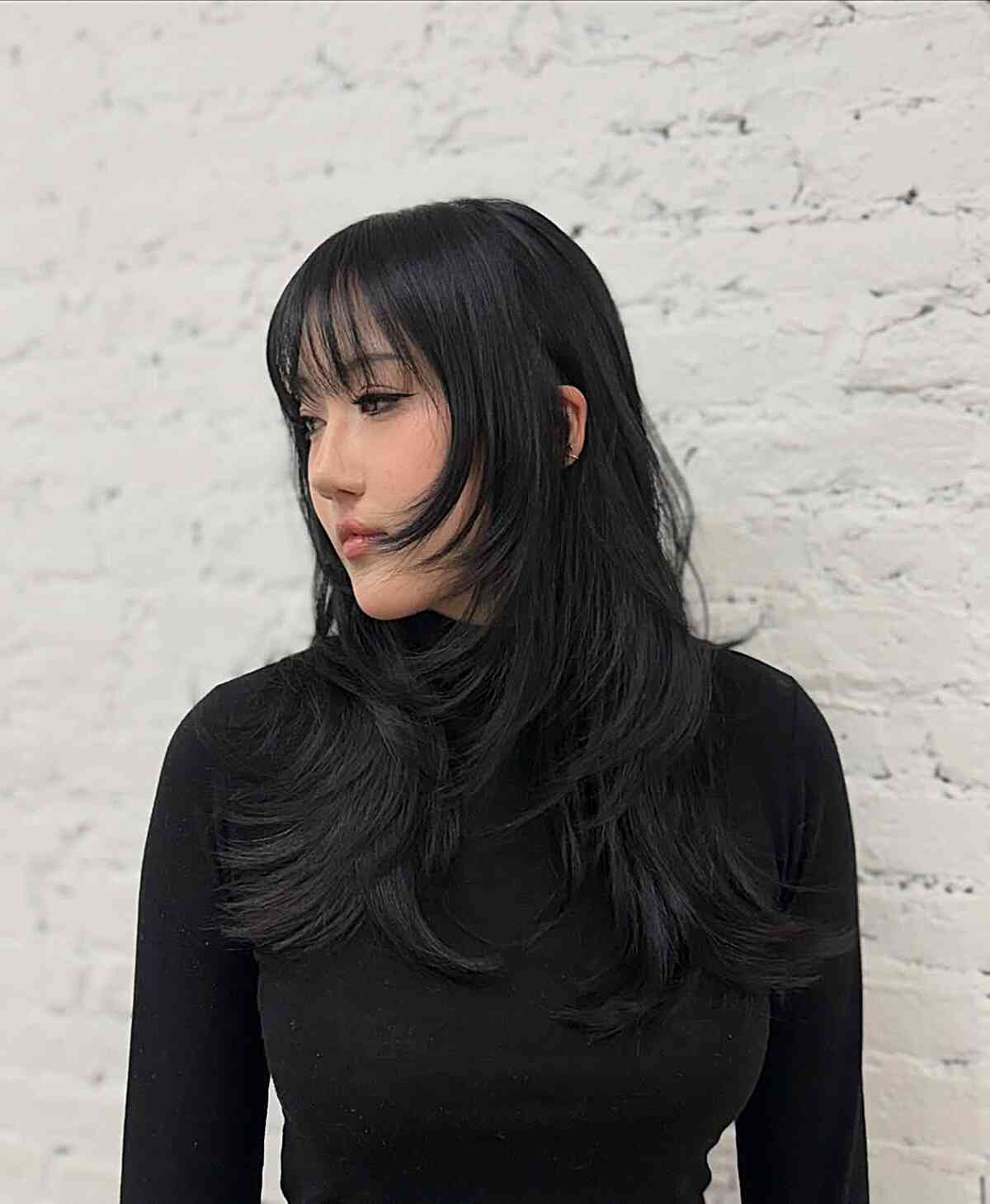 Stylish Wispy Bangs with Long Layers
