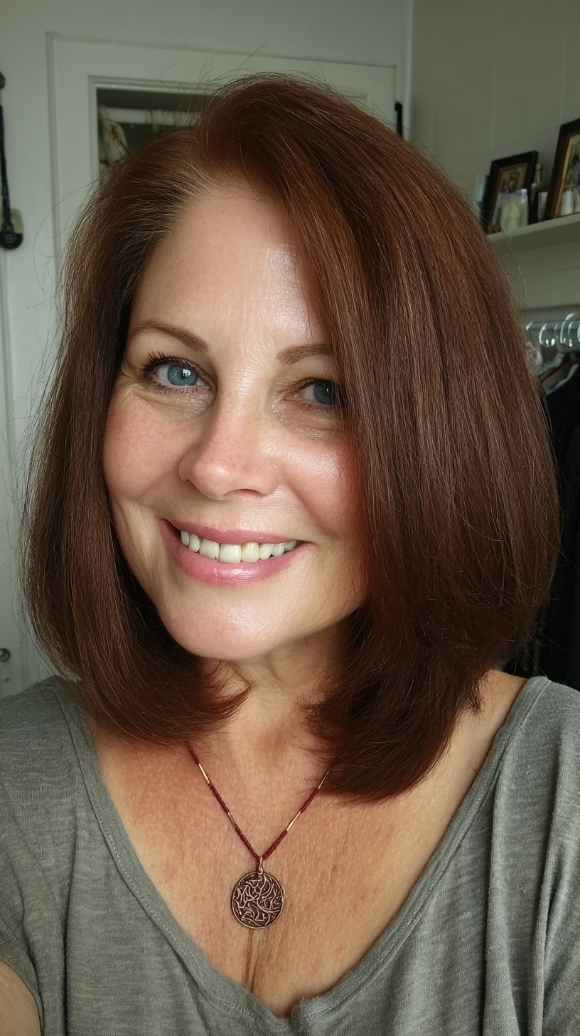 Warm Auburn Collarbone-Grazing Lob with Face-Framing Layers