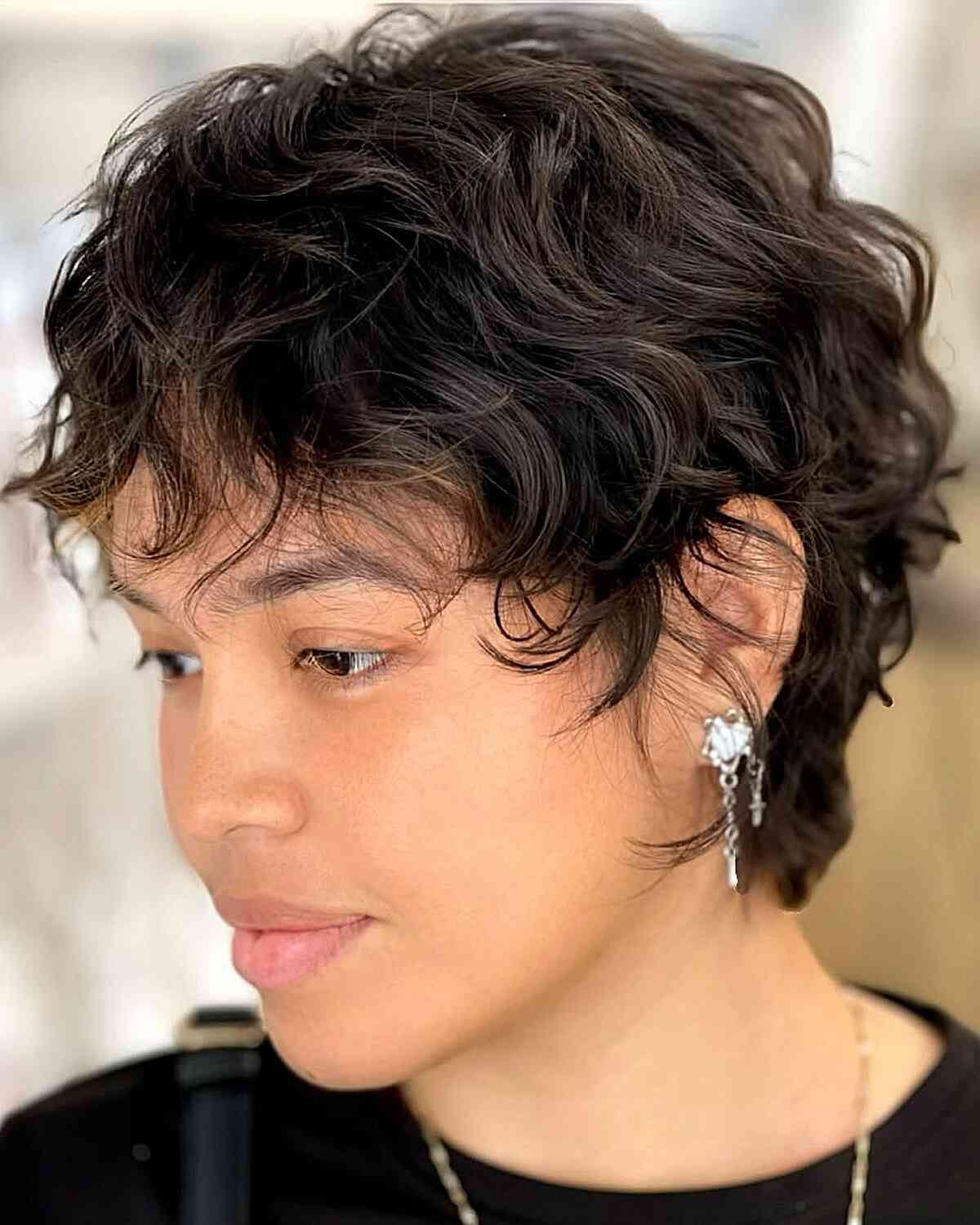 Textured Short Curly Haircut with Soft Layers