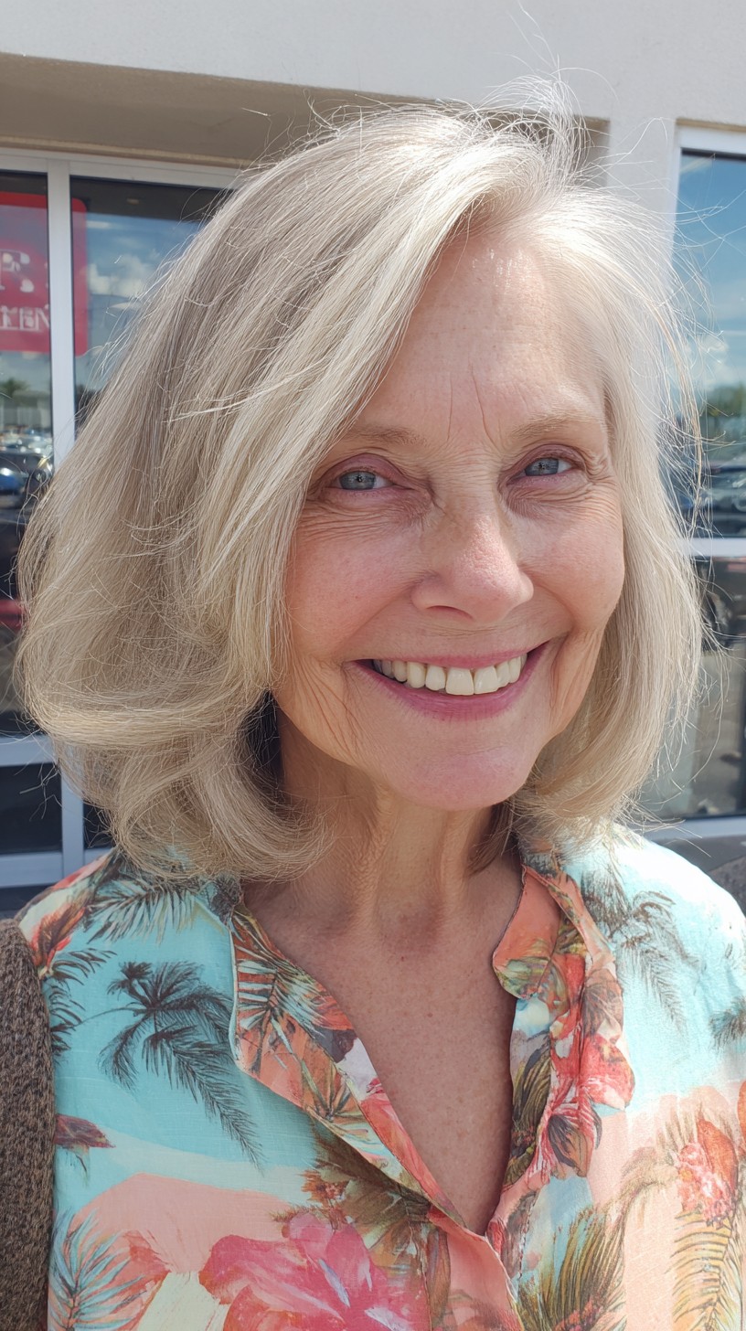 Soft Silver Shoulder-Skimming Layered Lob with Side-Swept Bevel