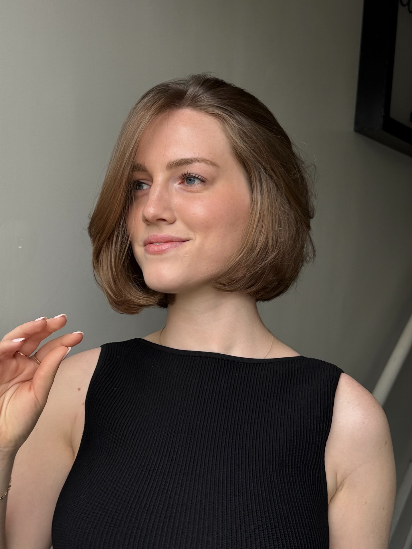 Rounded Chin-Length Bob with Interior Stack and Side-Swept Fringe