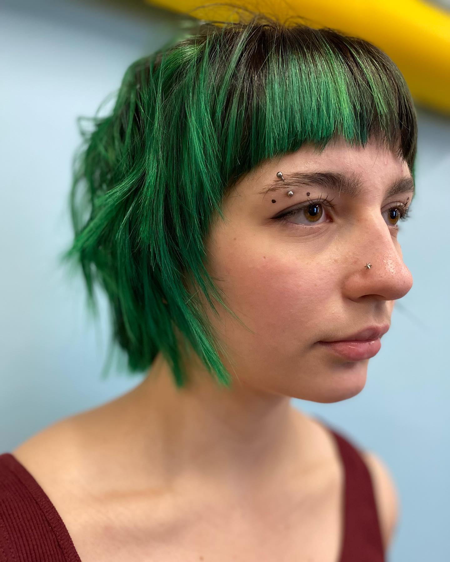 Emerald Choppy Crop with Blunt Micro Fringe