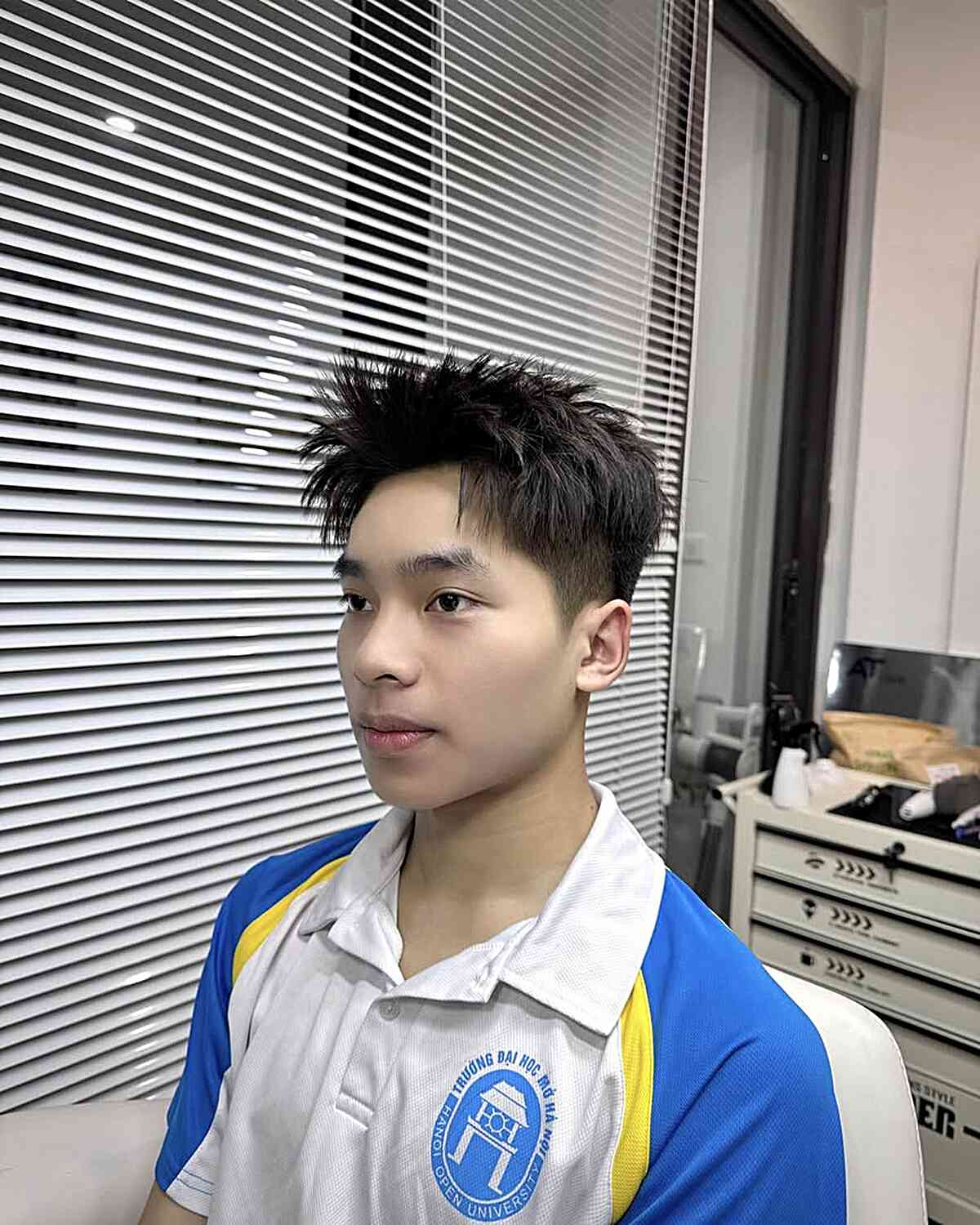 Modern Ivy League Haircut with Textured Top