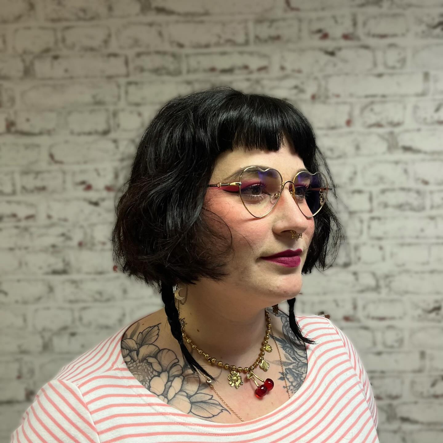 Short Choppy Chin-Length Bob with Mini Blunt Fringe and Accent Braids