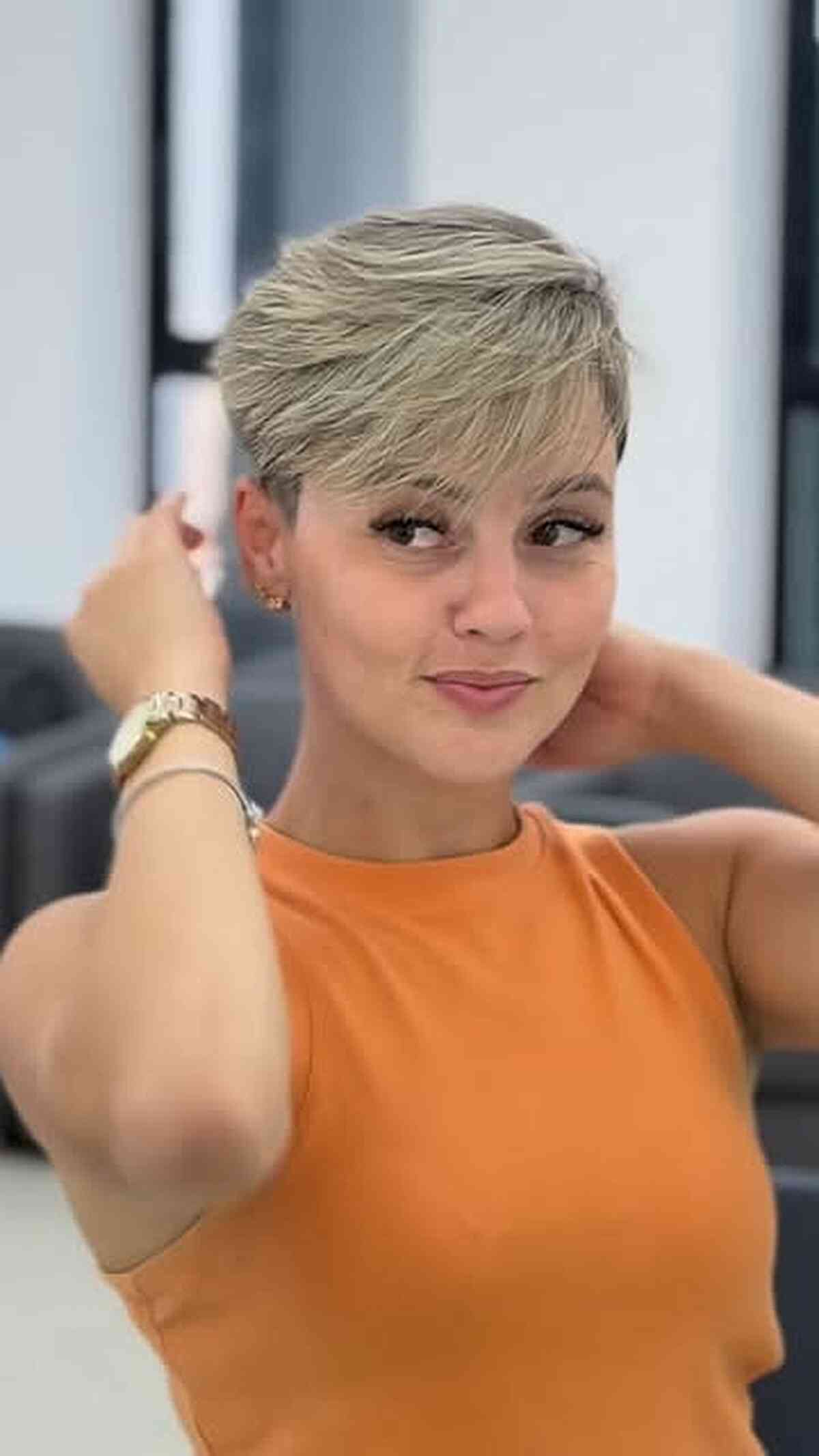 Trendy Ash Blonde Pixie Cut with Bangs