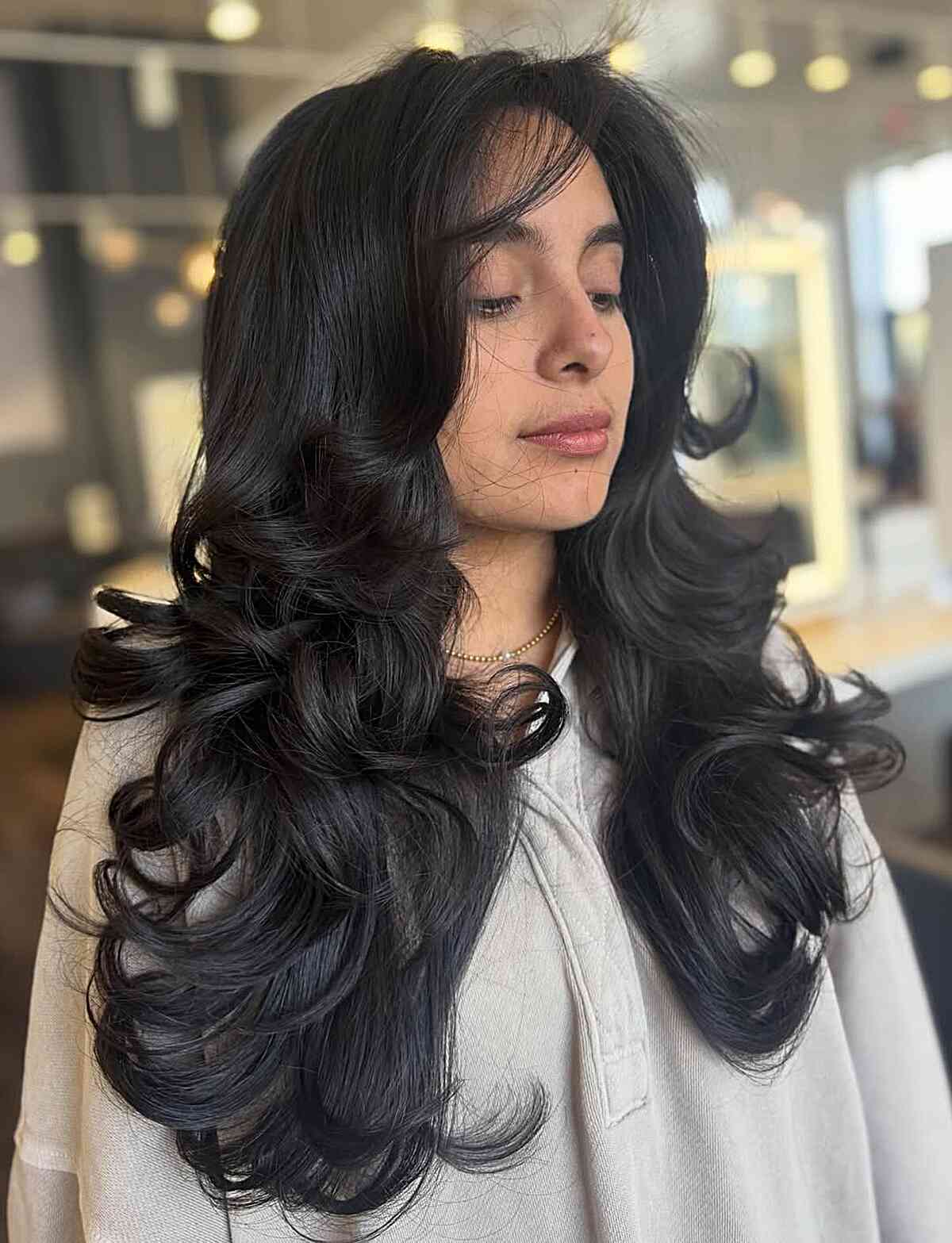 Elegant Butterfly Cut with Voluminous Layers