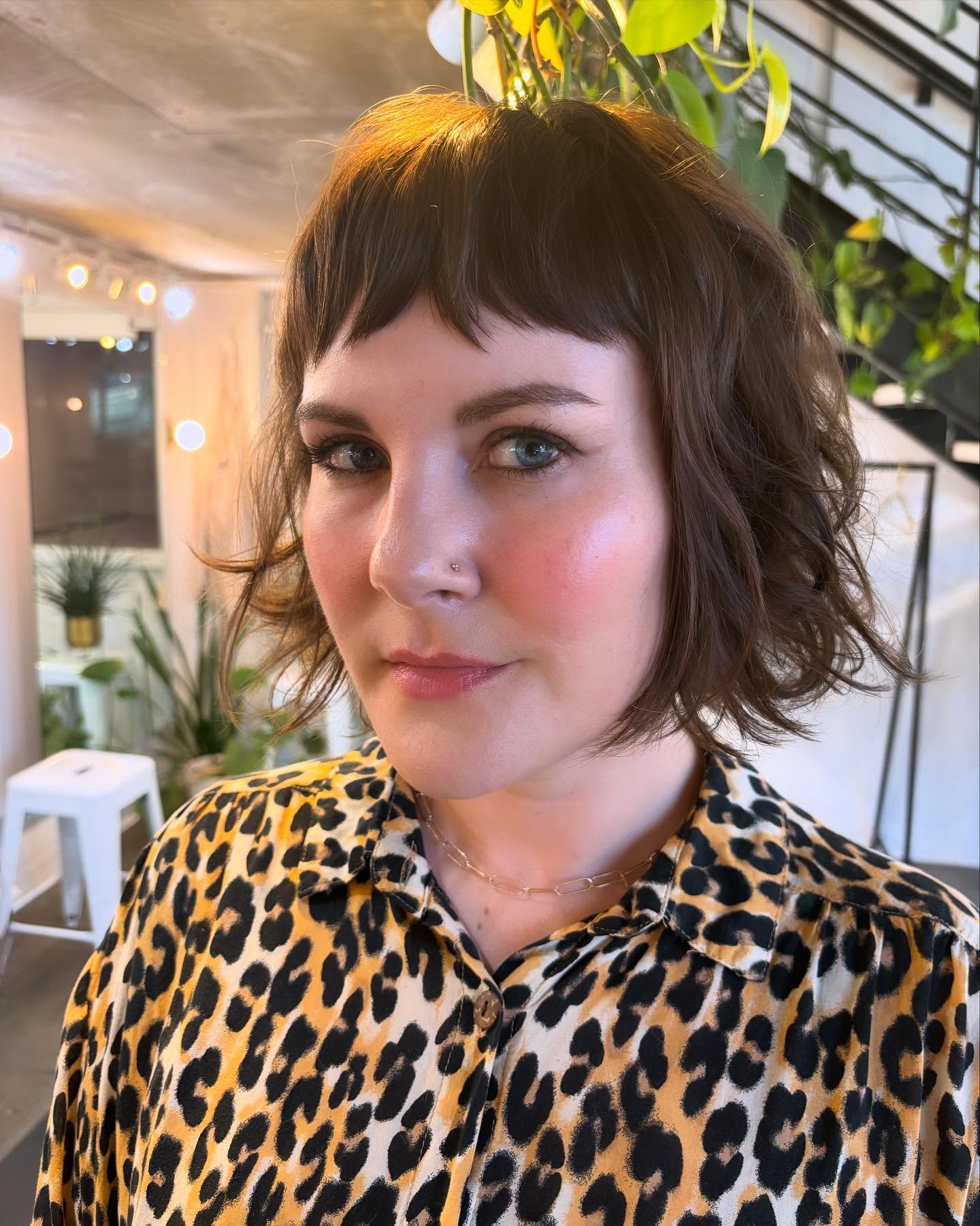 Feathered Chestnut Chin-Length Bob with Jagged Micro Fringe