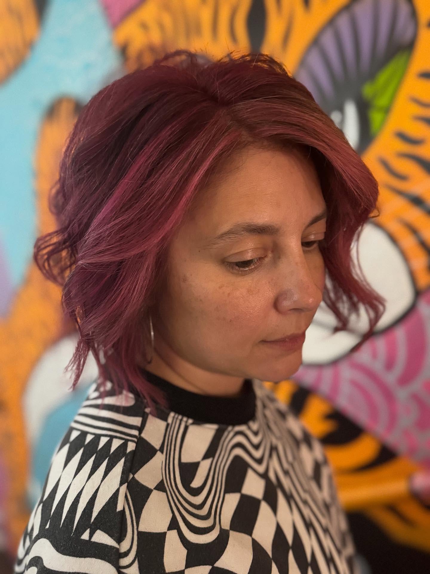 Magenta Razored Bob with Feathered Face-Framing