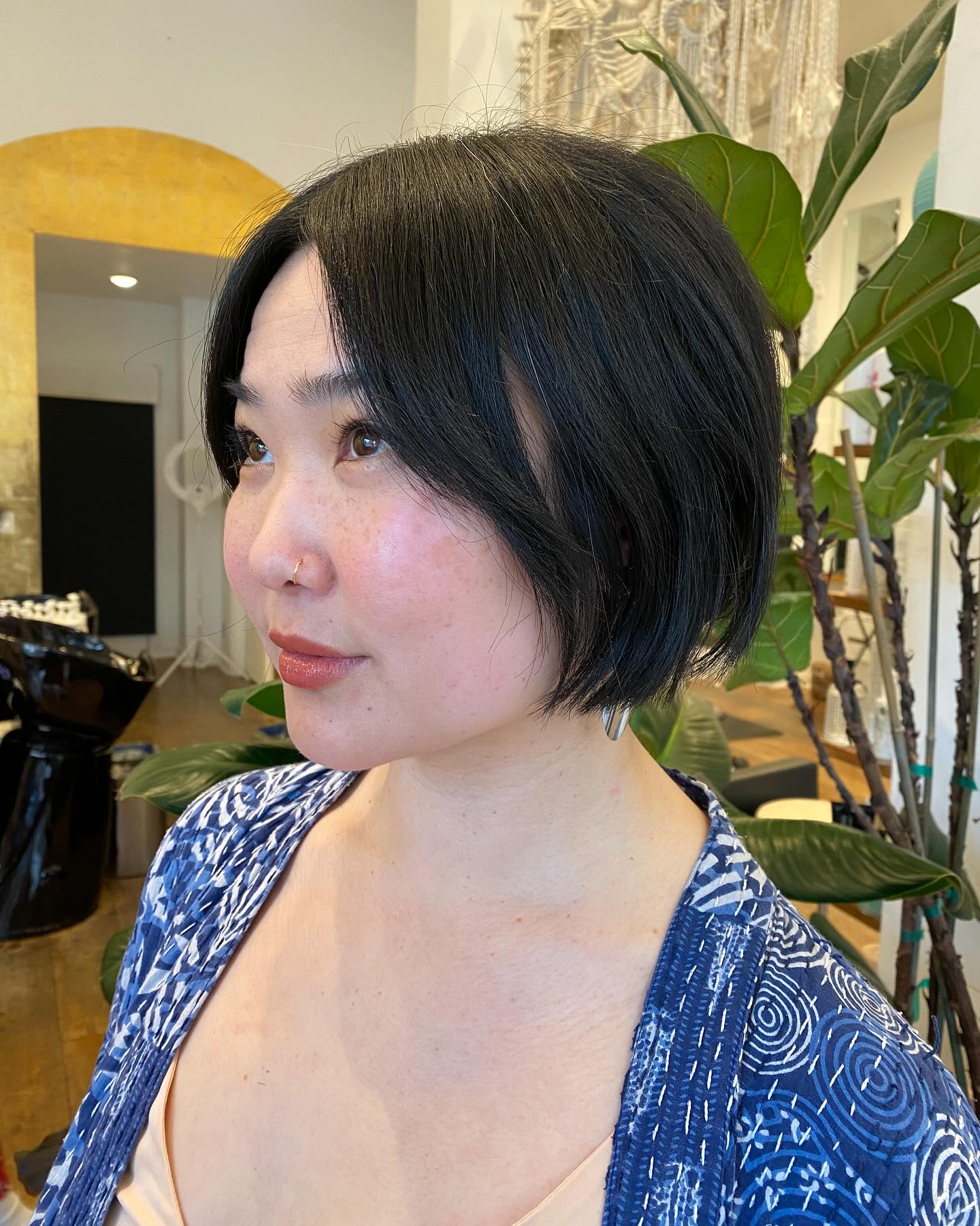 Sleek Chin-Length Razor-Textured Bob with Soft Curtain Pieces