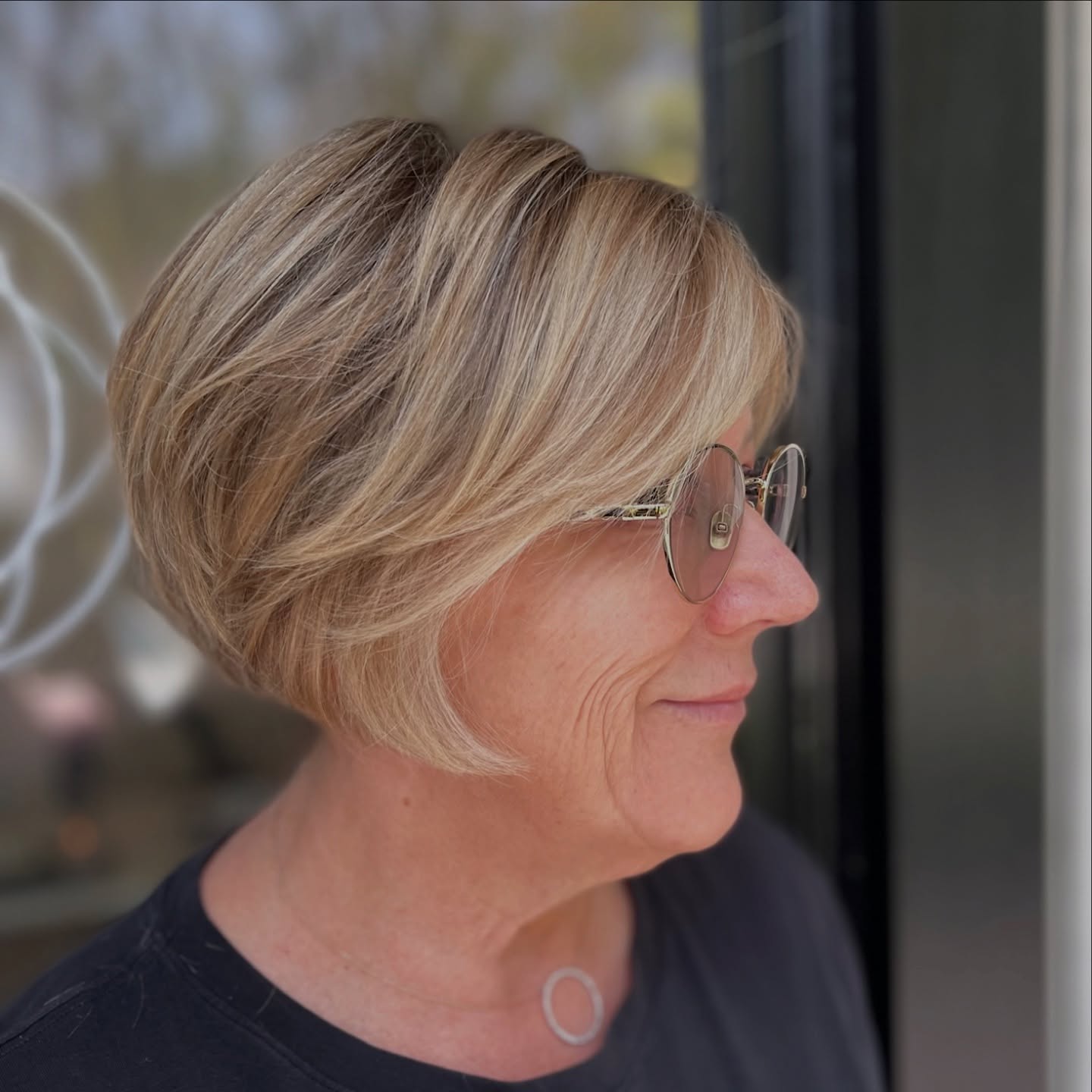 Stacked Razored Chin-Length Bob with Soft Frame and Root Shadow