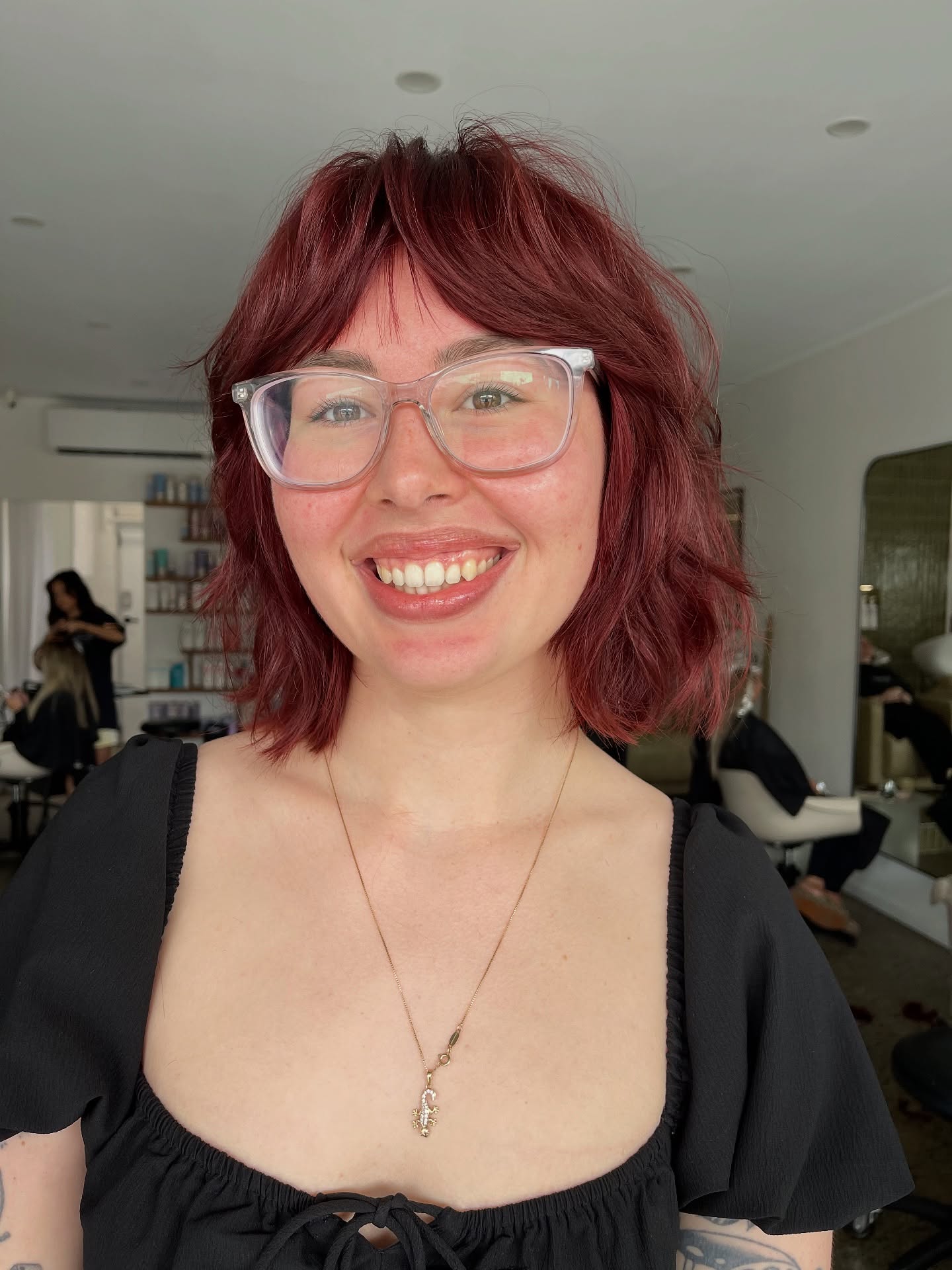 Textured Burgundy Razored Bob with Micro Bangs