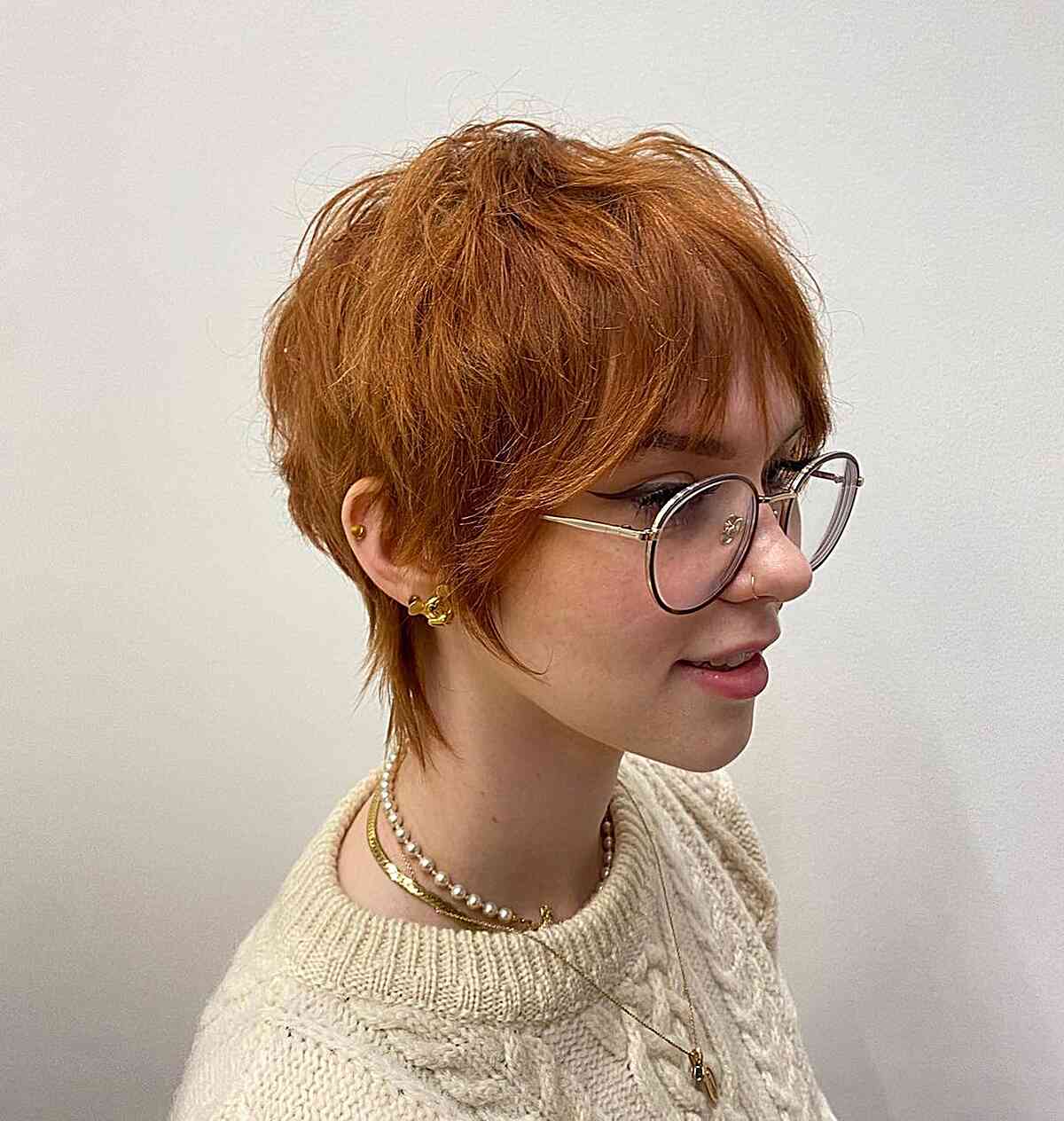 Short Layered Ginger Wixie with Face-Framing Bangs