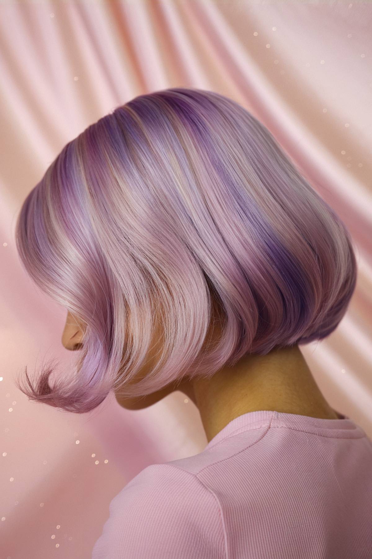 Gleamstone bob with a luminous pearl finish and blended champagne, blush, and lavender hues