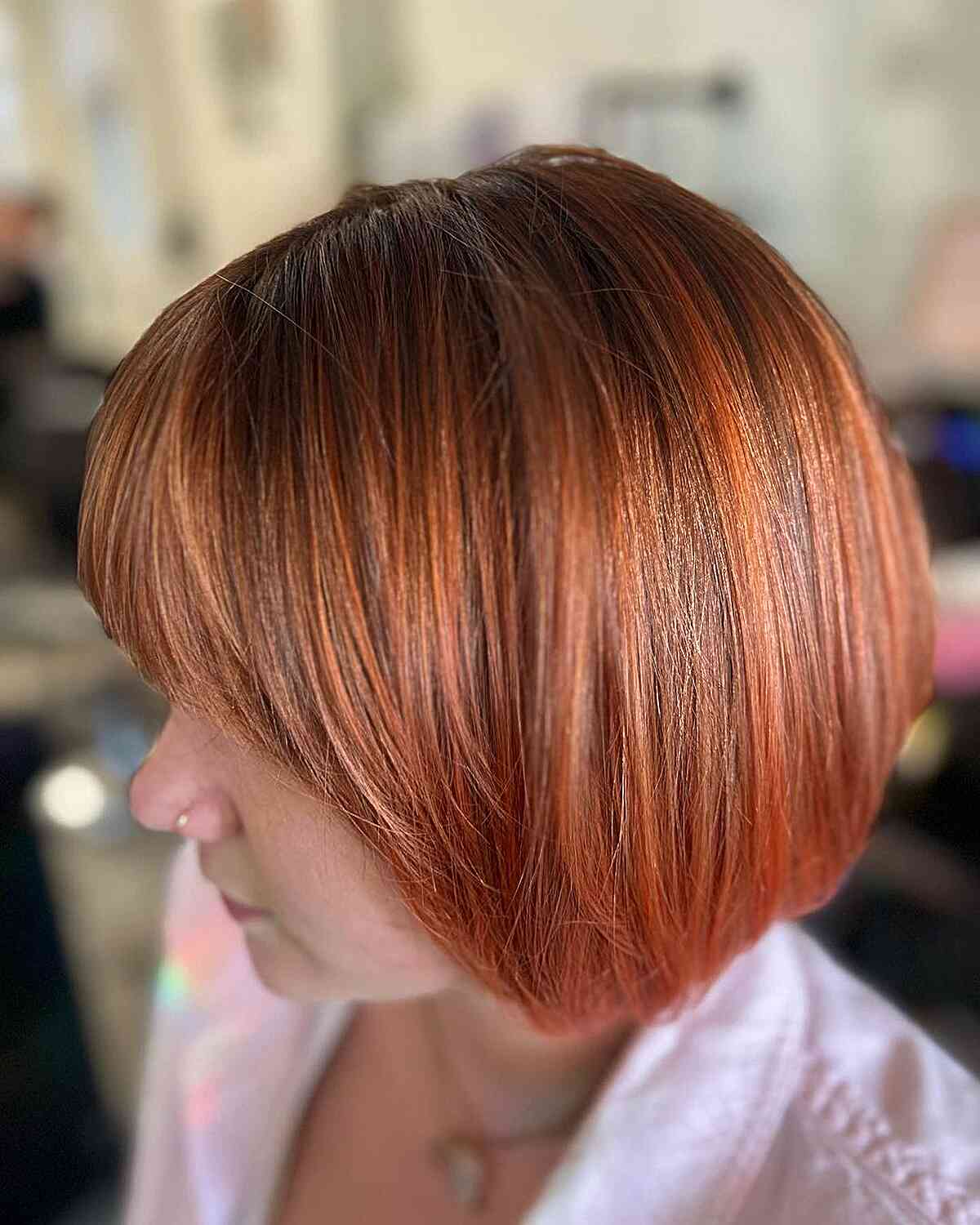 Glossy Pumpkin Spice Red Bob with Bangs