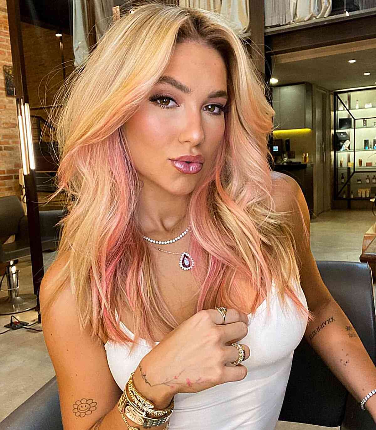Golden Blonde Hair with Light Pink Peekaboo Highlights
