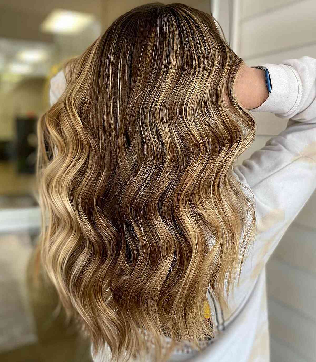 Golden Brown and Blonde Balayage Hair with Long Soft Waves