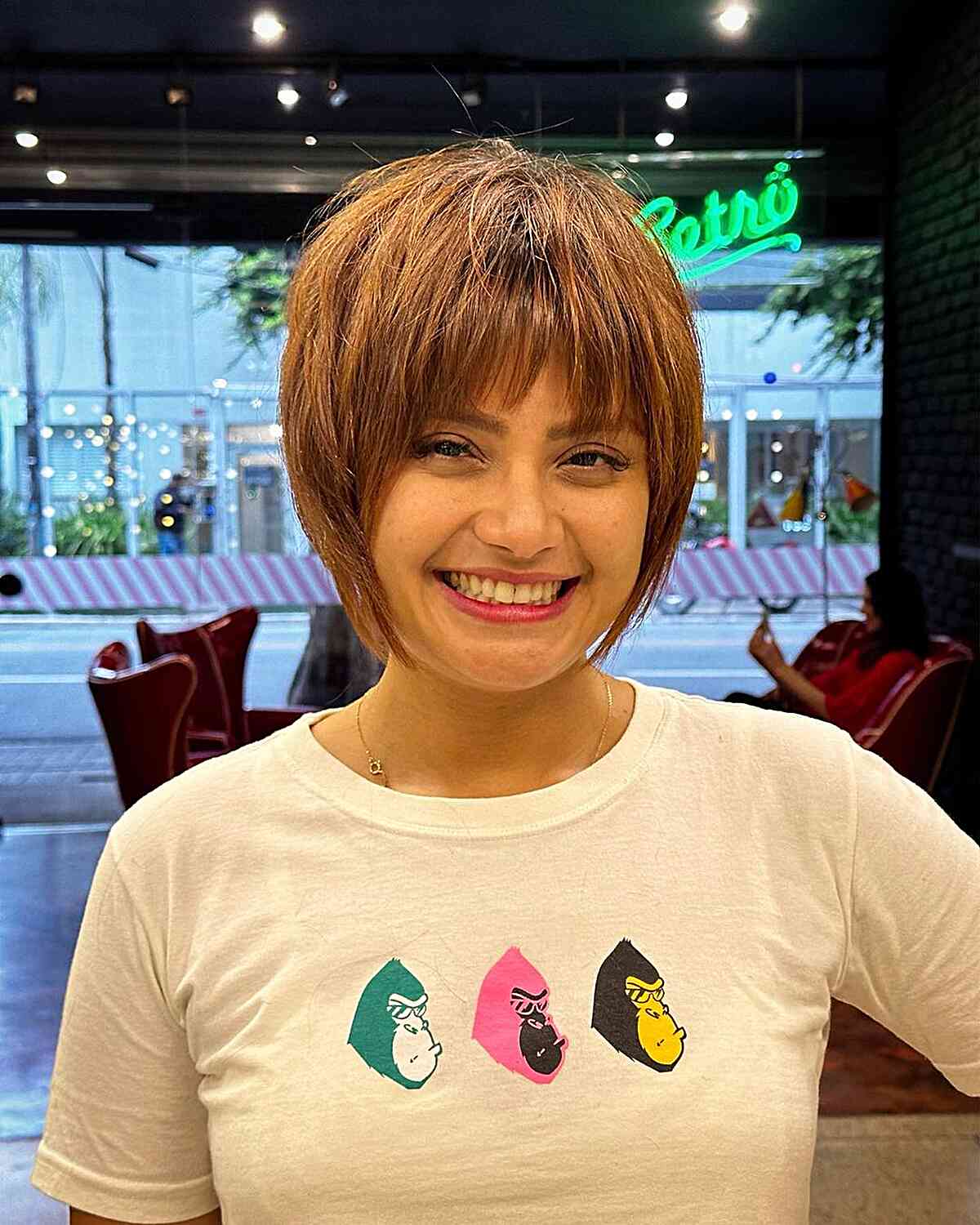 Golden Brown Chin-Length Bob with Choppy Fringe and Face-Framing Layers