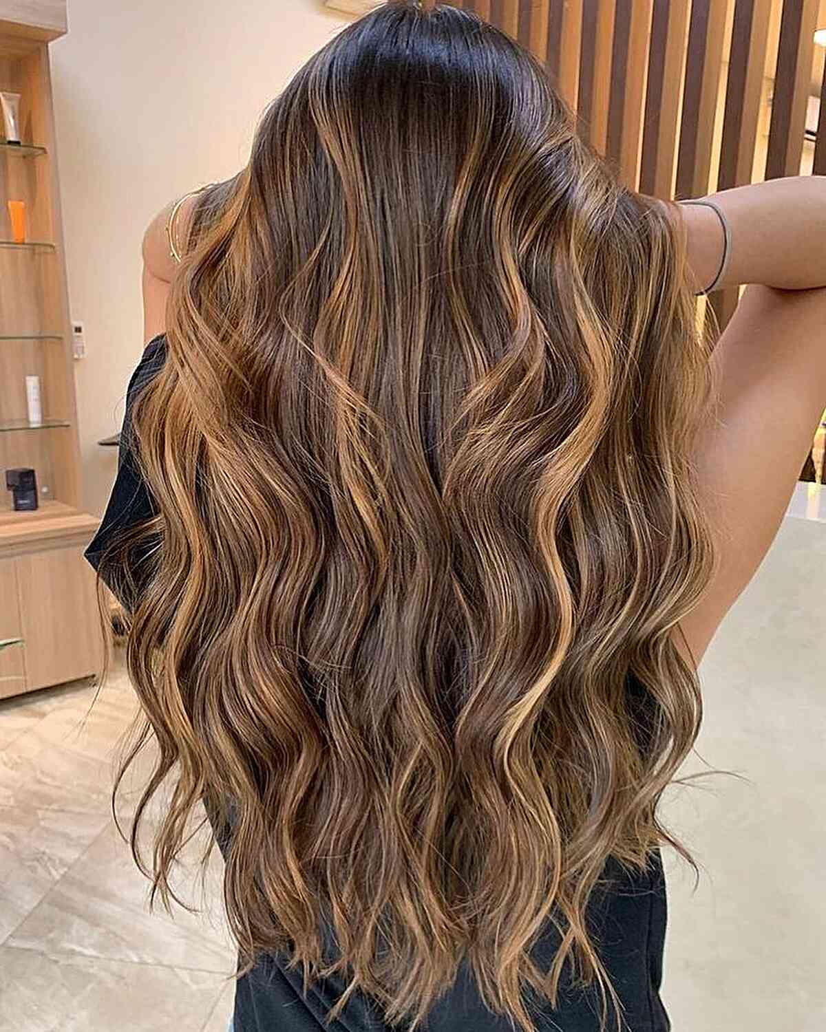 Golden Caramel Brown Balayage Highlights on Long-Length Wavy Hair