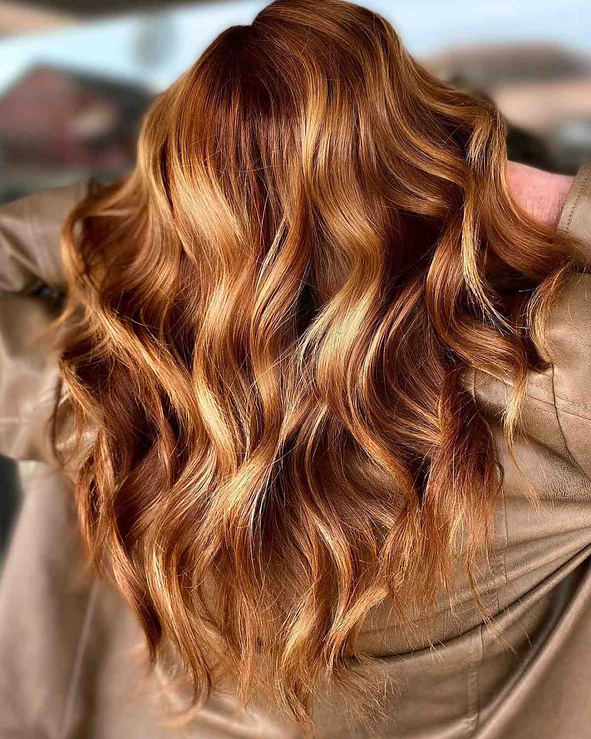 golden caramel color with long loose curls