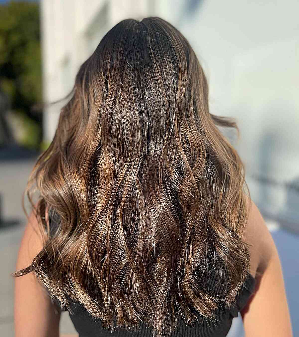 Mid-Length Golden Chocolate Brown Balayage Waves with Layers