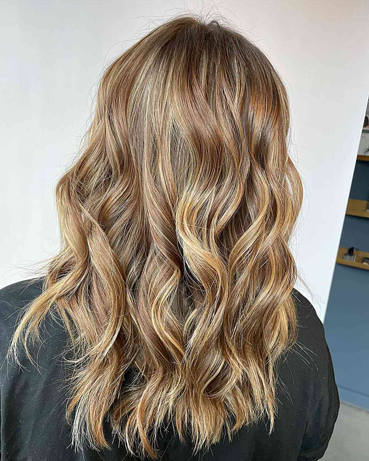Golden Dirty Bronde Balayage Foilayage with Hints of Copper for Choppy Medium Hair