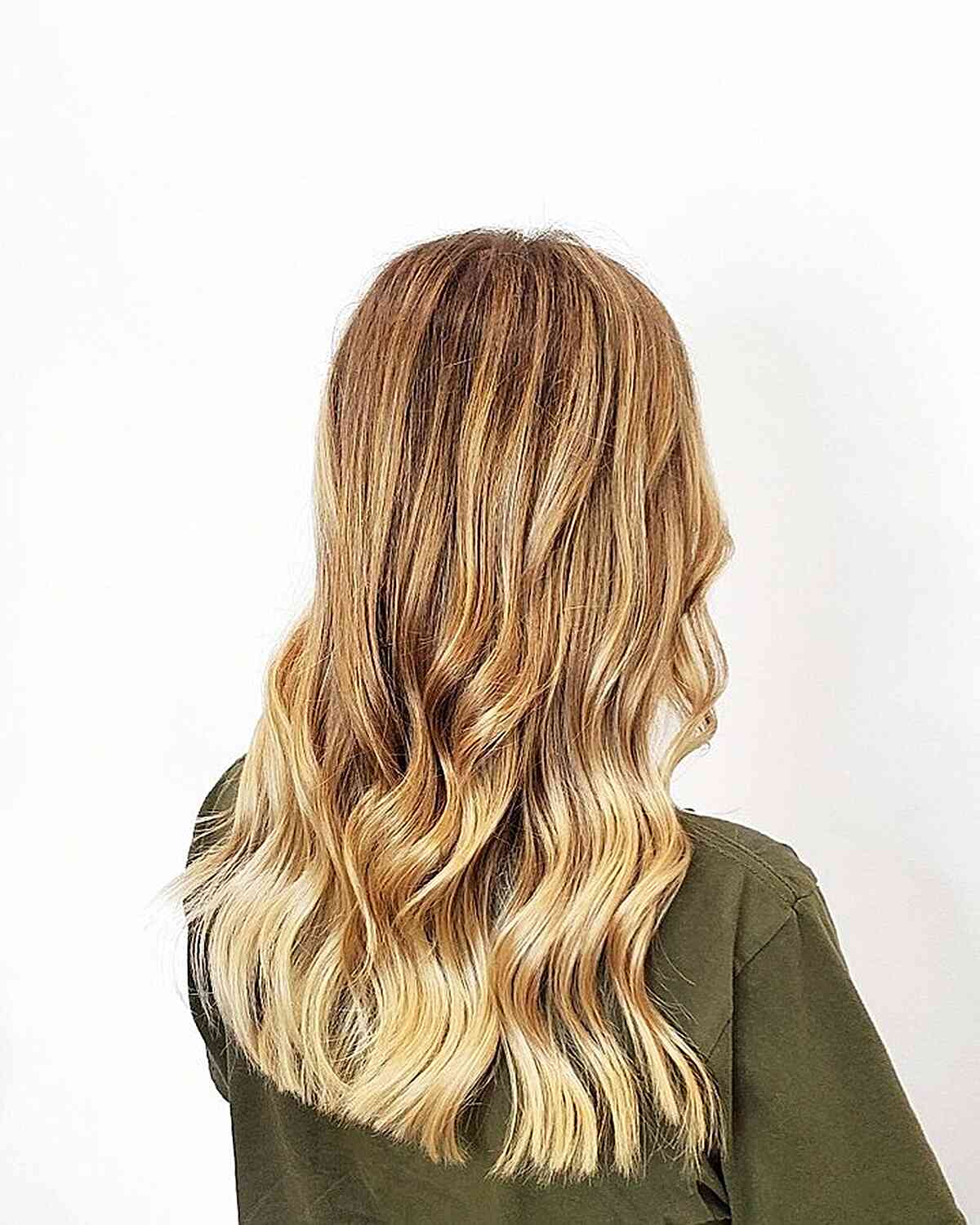 Golden Lived-in Blonde Balayage for Long Wavy Hair