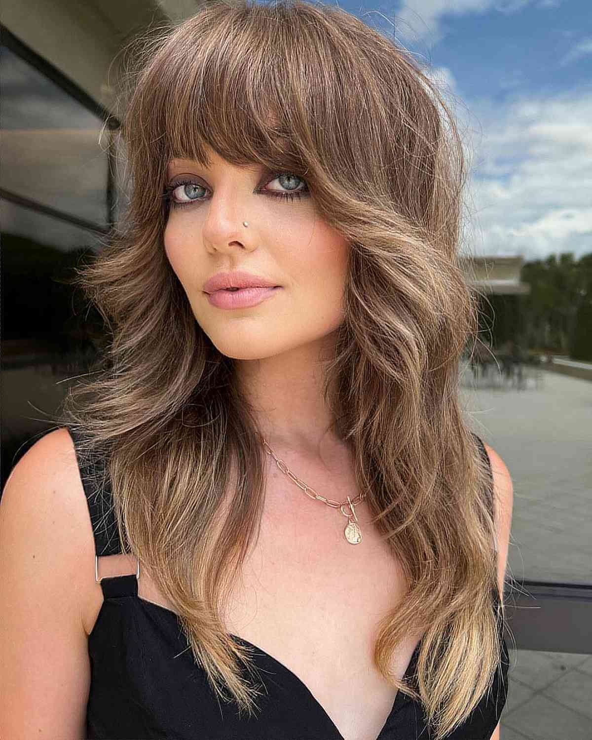 Goldie Hawn-Inspired Long Shag with Bangs