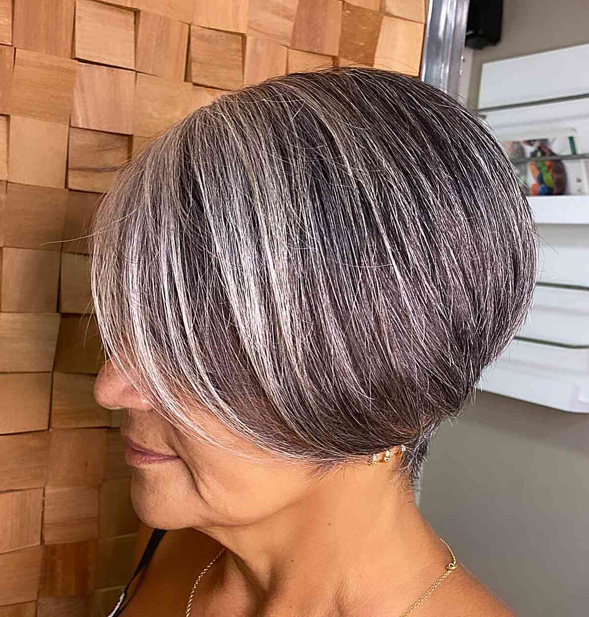 Gorgeous Gray Hair Color with Blonde Highlights for Women Aged 50