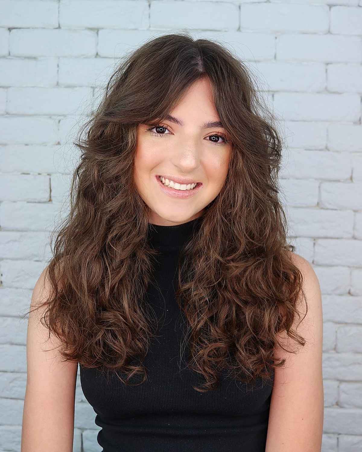 gorgeous long curly hair with a center part