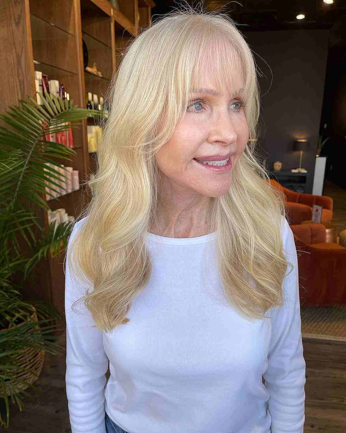 Gorgeous Long Hairstyle with Soft Waves for a 70-Year-Old Woman
