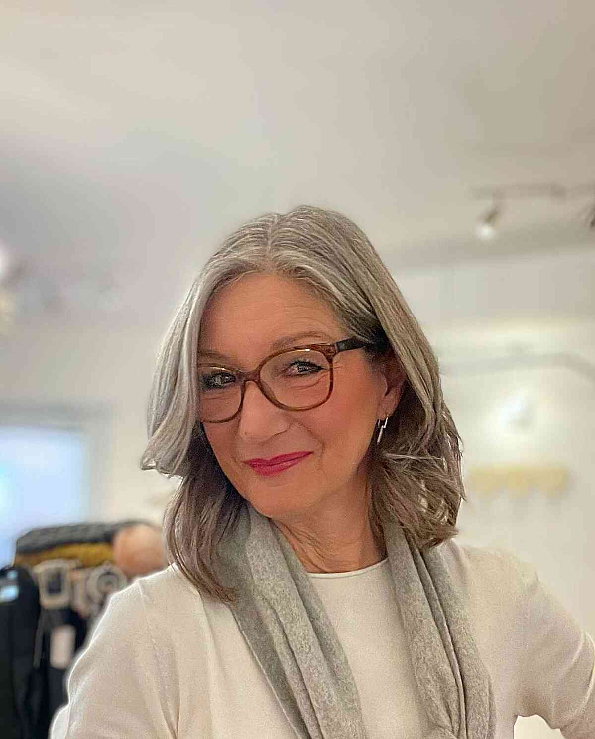 Gorgeous Off Center Part on a Shoulder-Length Bob for Women Over 60 with Glasses