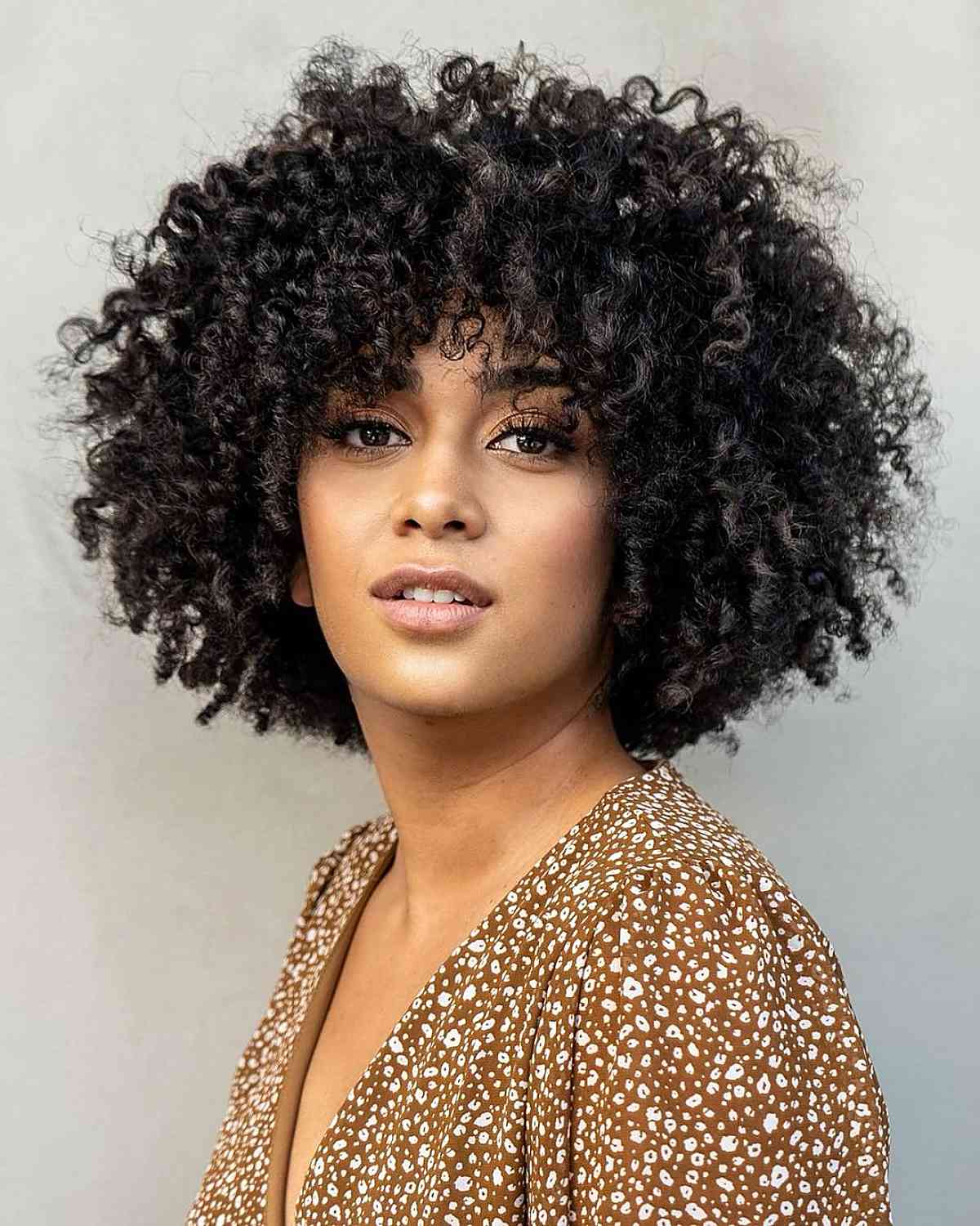 Black Woman Short Natural Curly Hairstyles on Stylevore