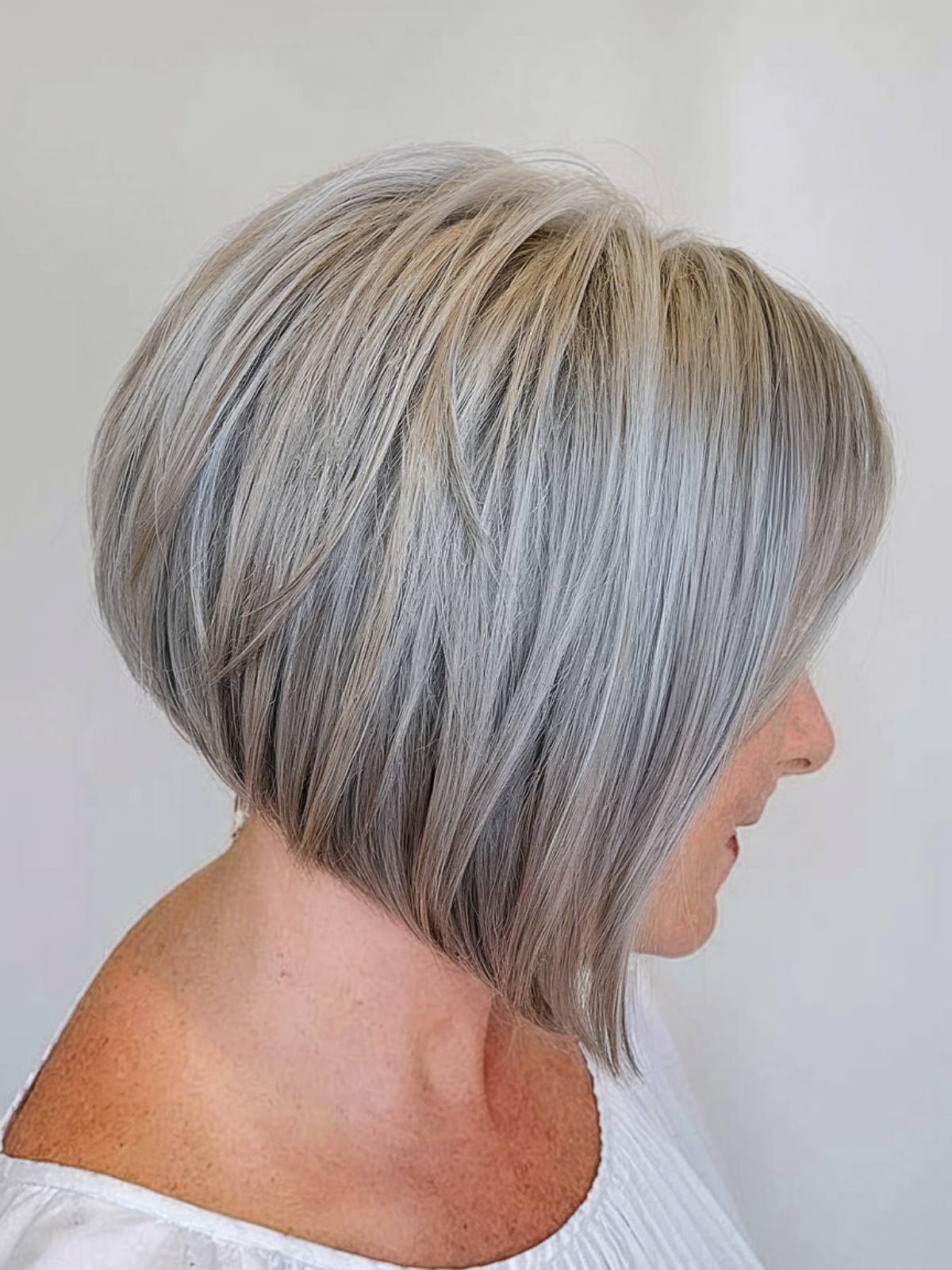 Gray angled bob haircut with layered volume