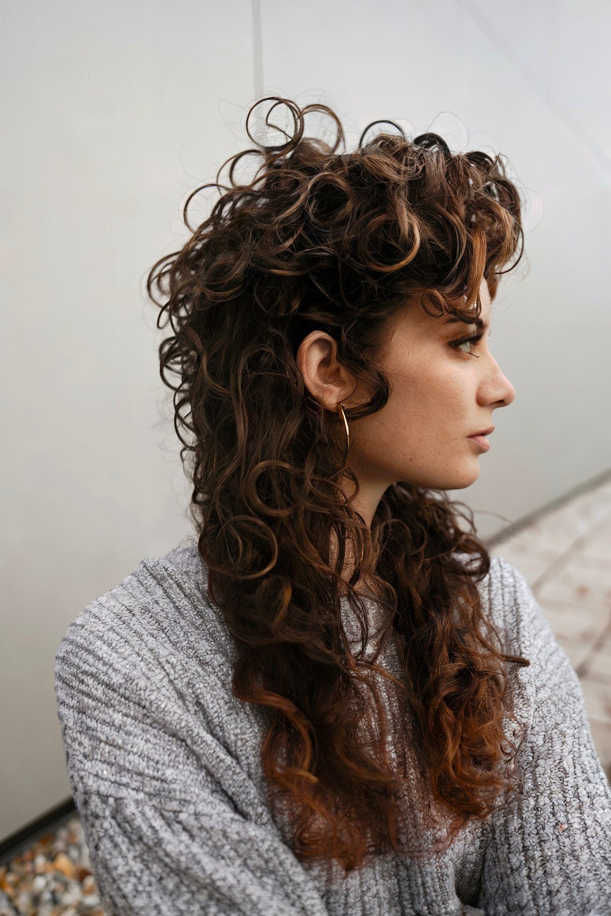 Long curly mullet hairstyle with natural curls